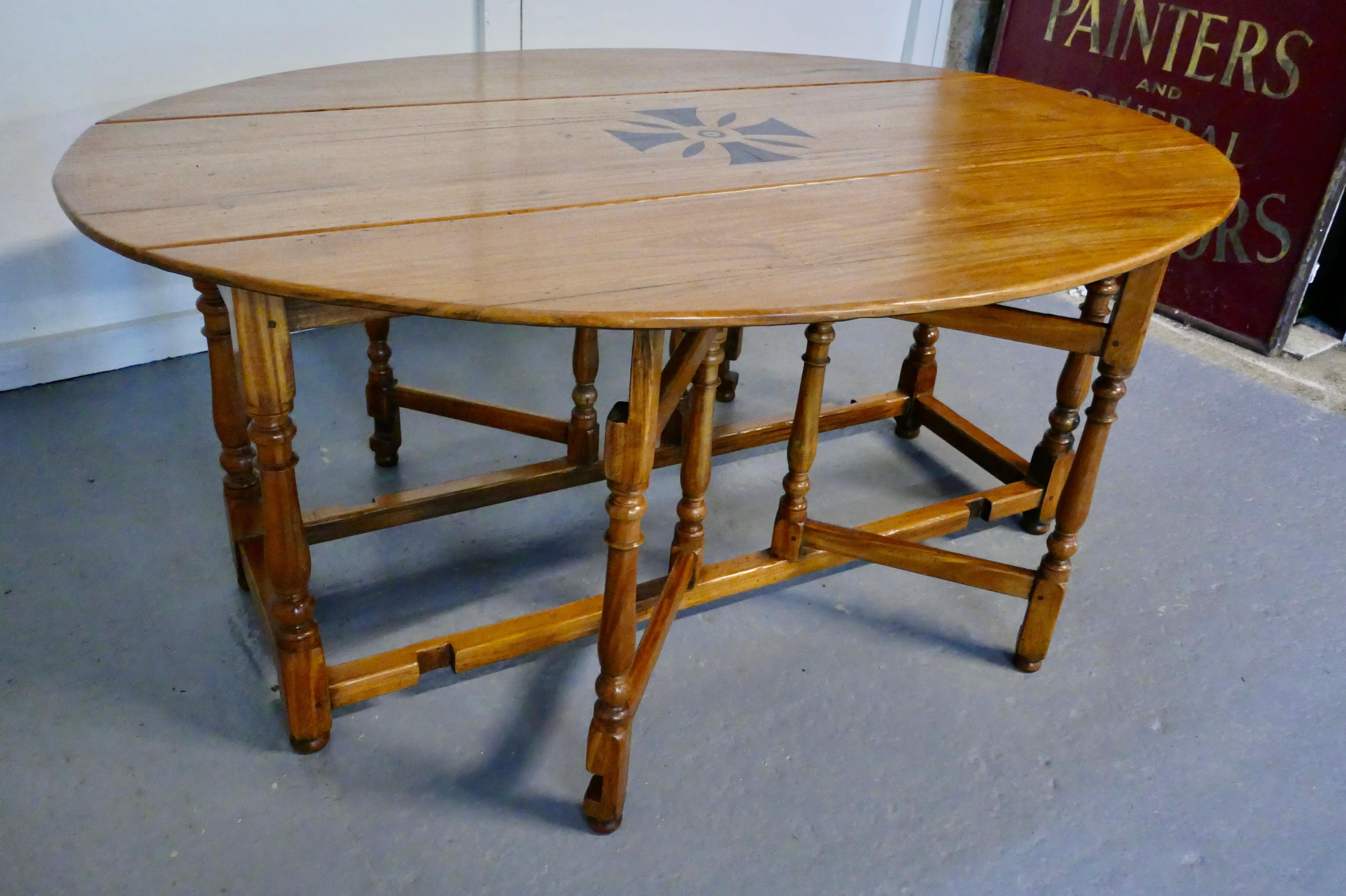 Walnut Large French Gate Leg Dining Table    This is a large table with double gate leg For Sale