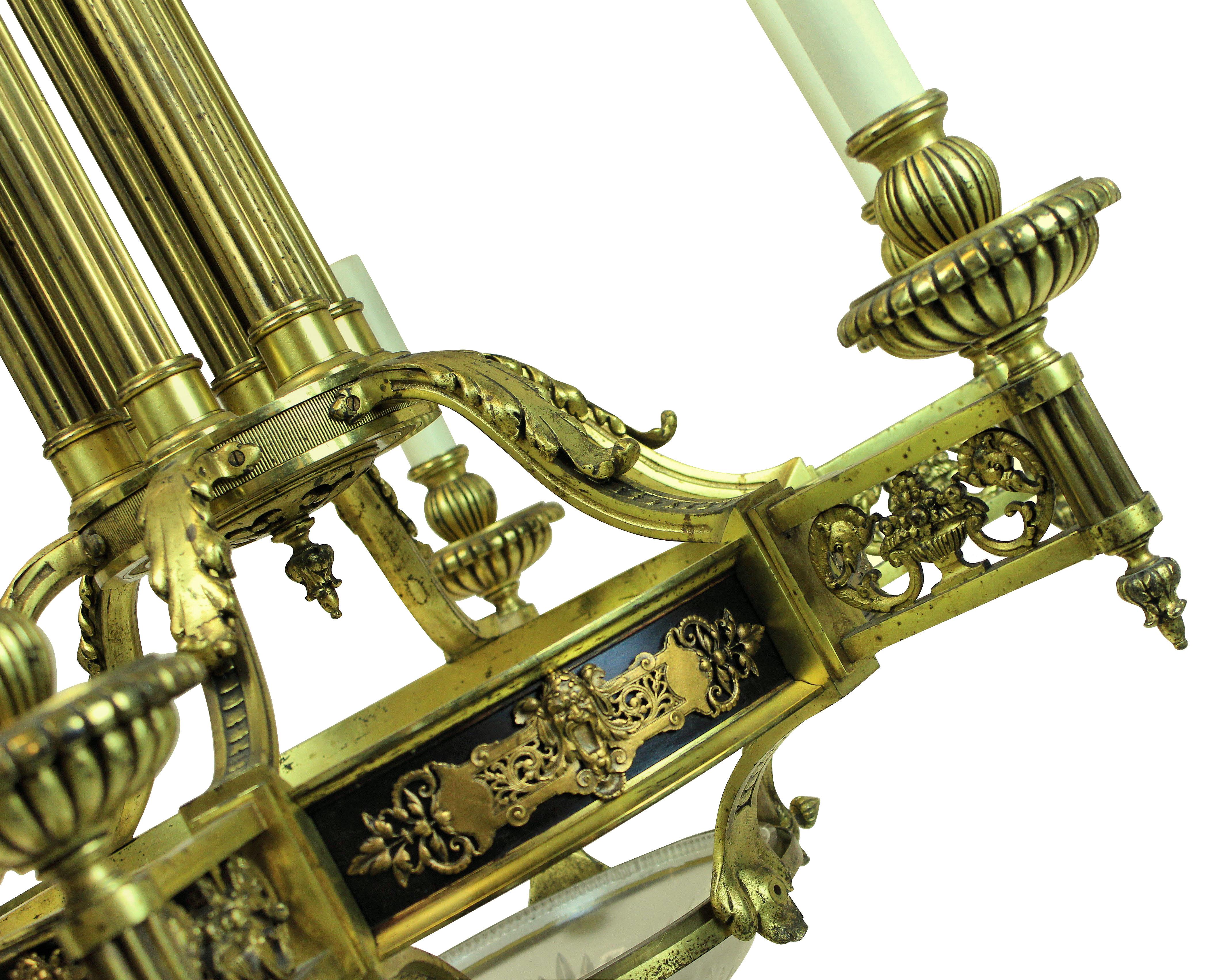 A large French Second Empire, six branch chandelier in gilt bronze, with neoclassical features and a cut glass dish to the base. Of fine quality.

Newly electrified.
 