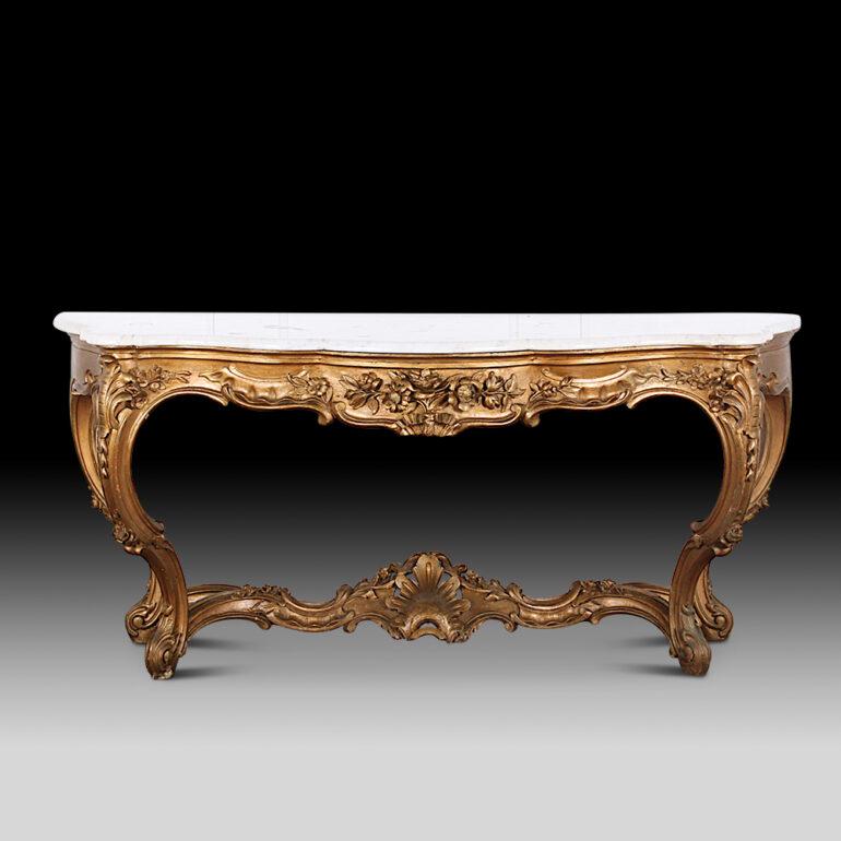 Large French gilt marble top console table. Signed.