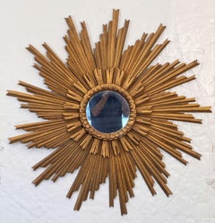 Gran espejo dorado francés en forma de estrella o de sol (diámetro 45 1/2)