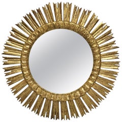 Gran espejo dorado francés con forma de estrella o de sol (diámetro 24 1/2)