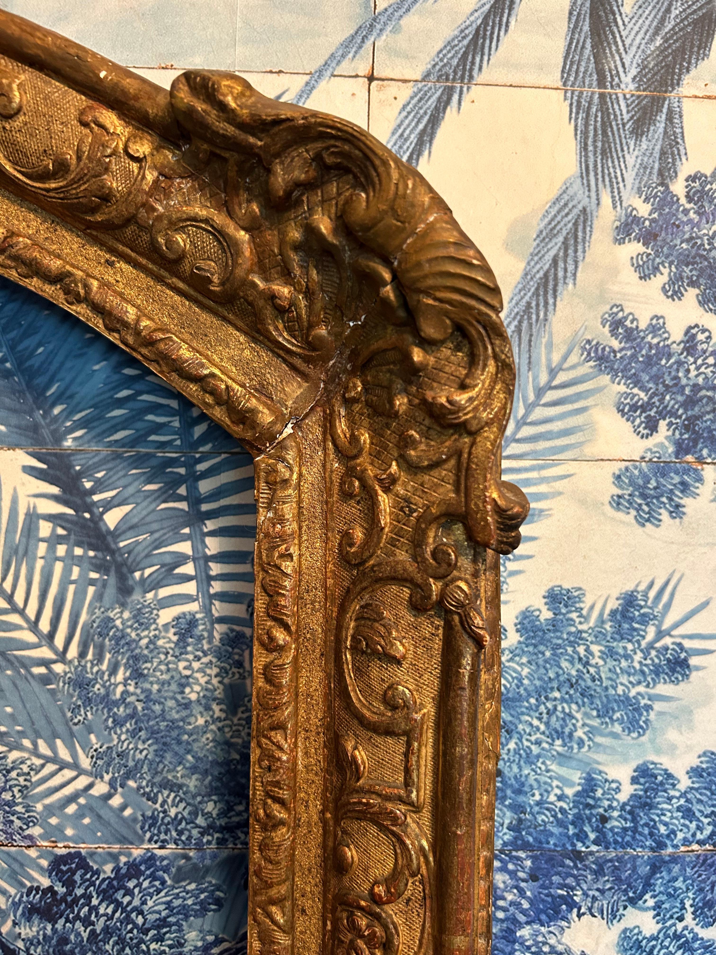 Carved Large French Giltwood Mirror Frame with Rounded Top For Sale