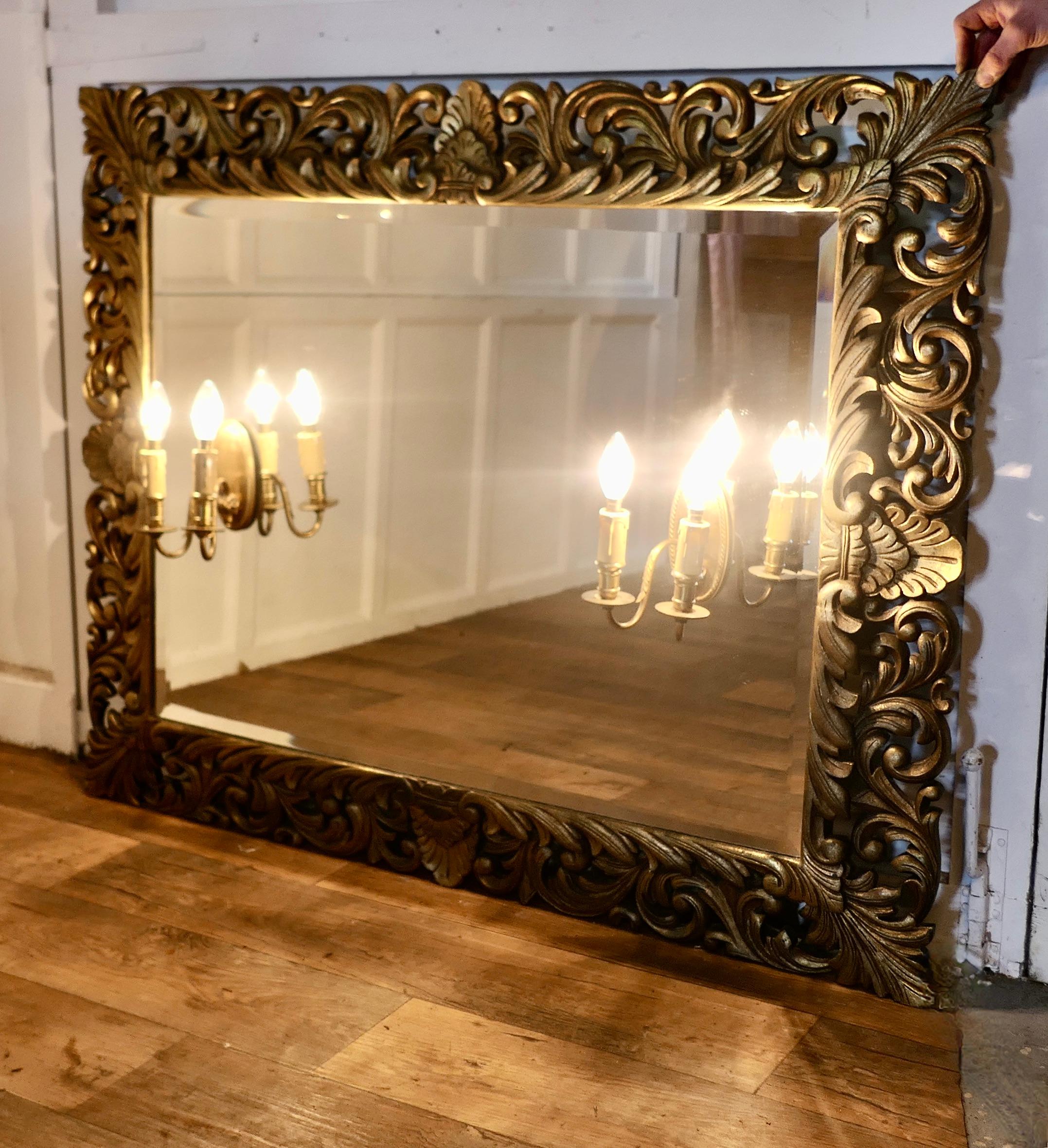 French Provincial Large French Gothic Gilt Overmantel Mirror with Twin Sconces    For Sale