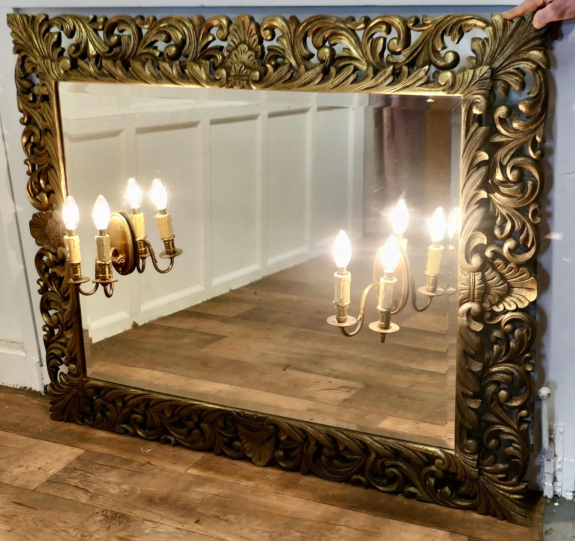 Early 20th Century Large French Gothic Gilt Overmantel Mirror with Twin Sconces    For Sale