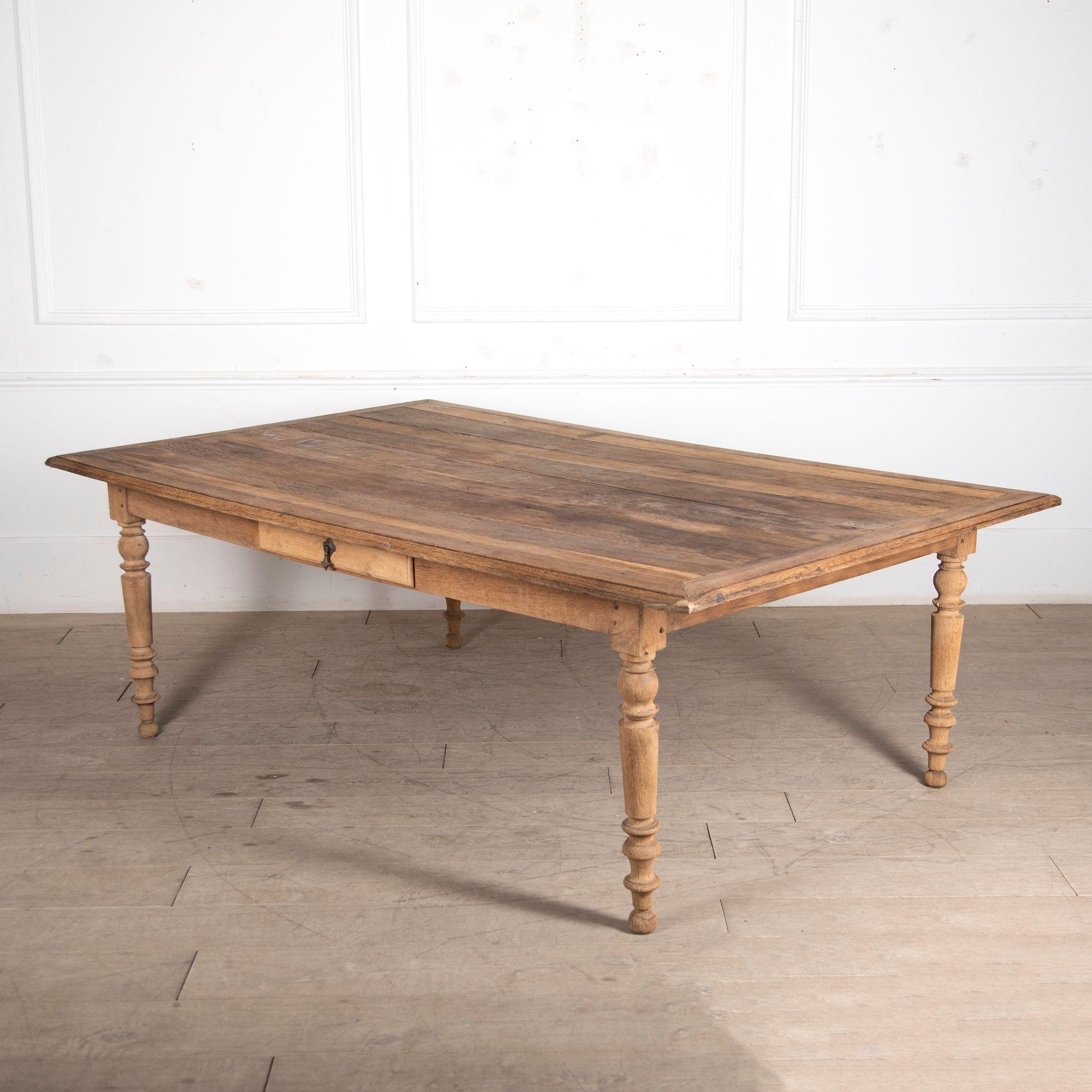 Large 19th Century French bleached industrial oak dining table.
The proportions allow two diners at each end as well as at least four on either side. Containing two drawers.
Circa 1890.