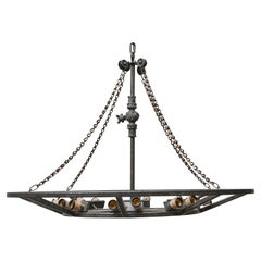 Grande lampadario industriale francese in ferro a 12 luci, 1920 circa - US wired