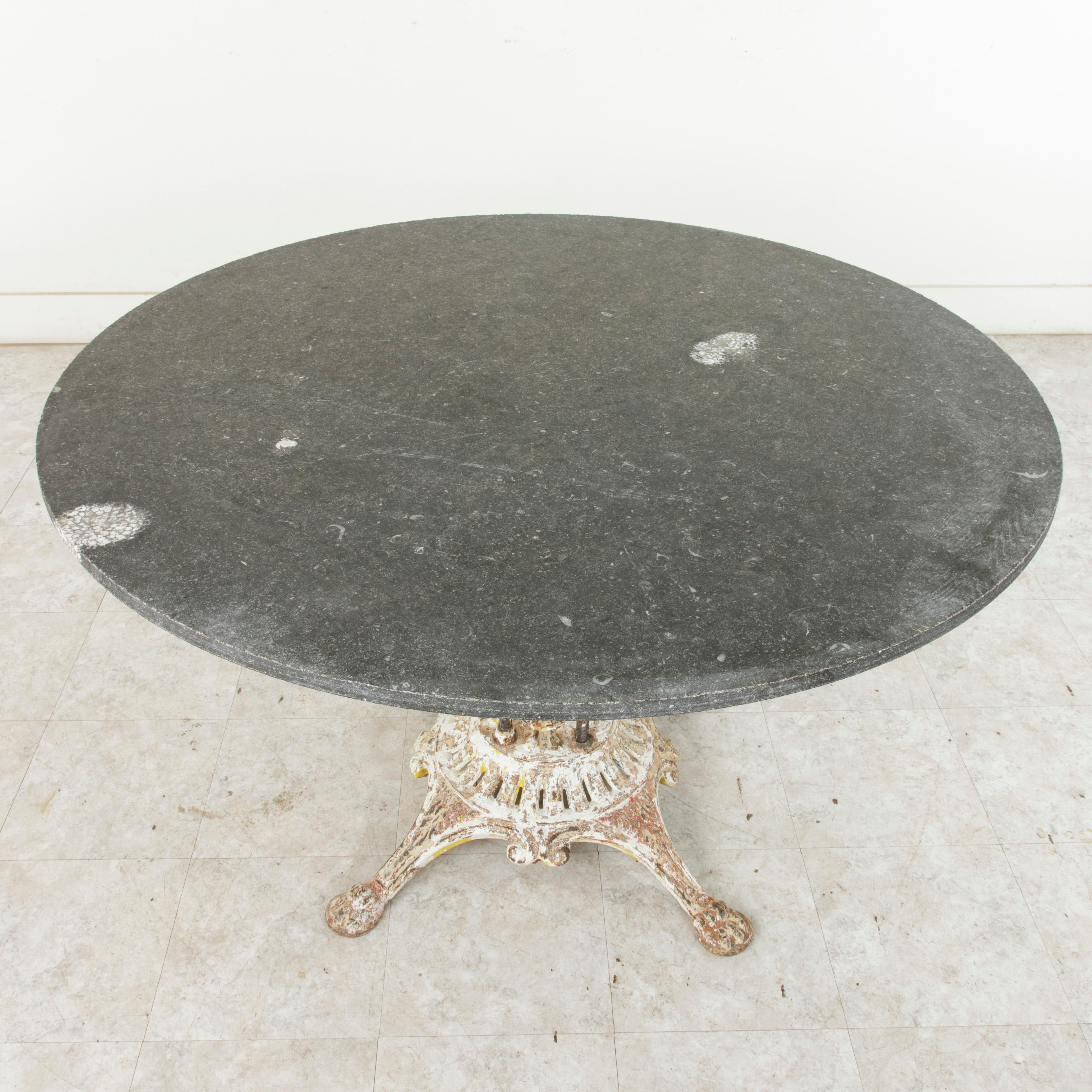 Early 20th Century Large French Iron Garden Table with 49 Inch Diameter Blue Stone Top, circa 1900