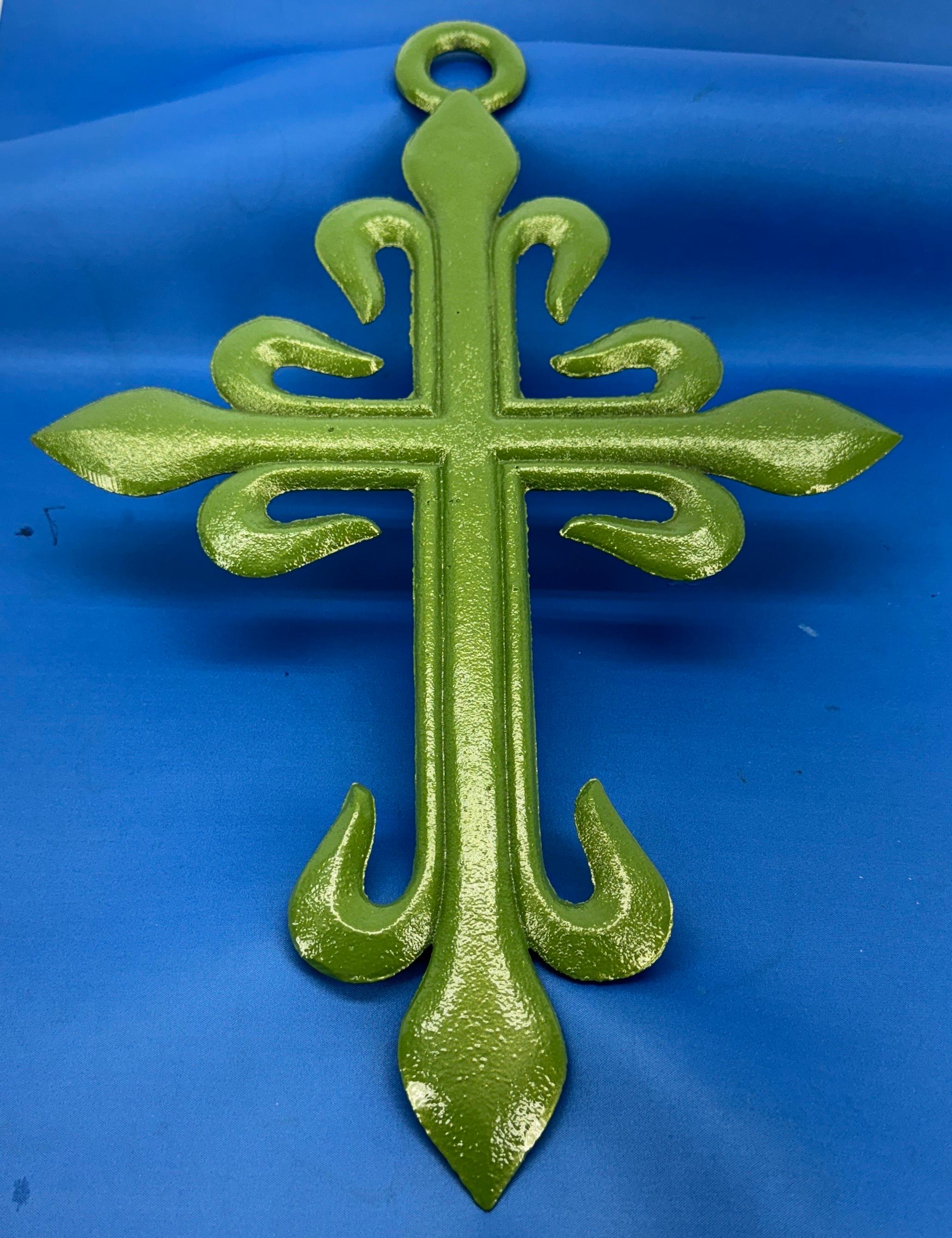 A stunning French wall crucifix newly powder coated in a fantastic shade of green. This substantial sculpture in solid would make a statement on a gallery wall featuring other crosses or certainly could be a stand-alone piece indoor as well on a