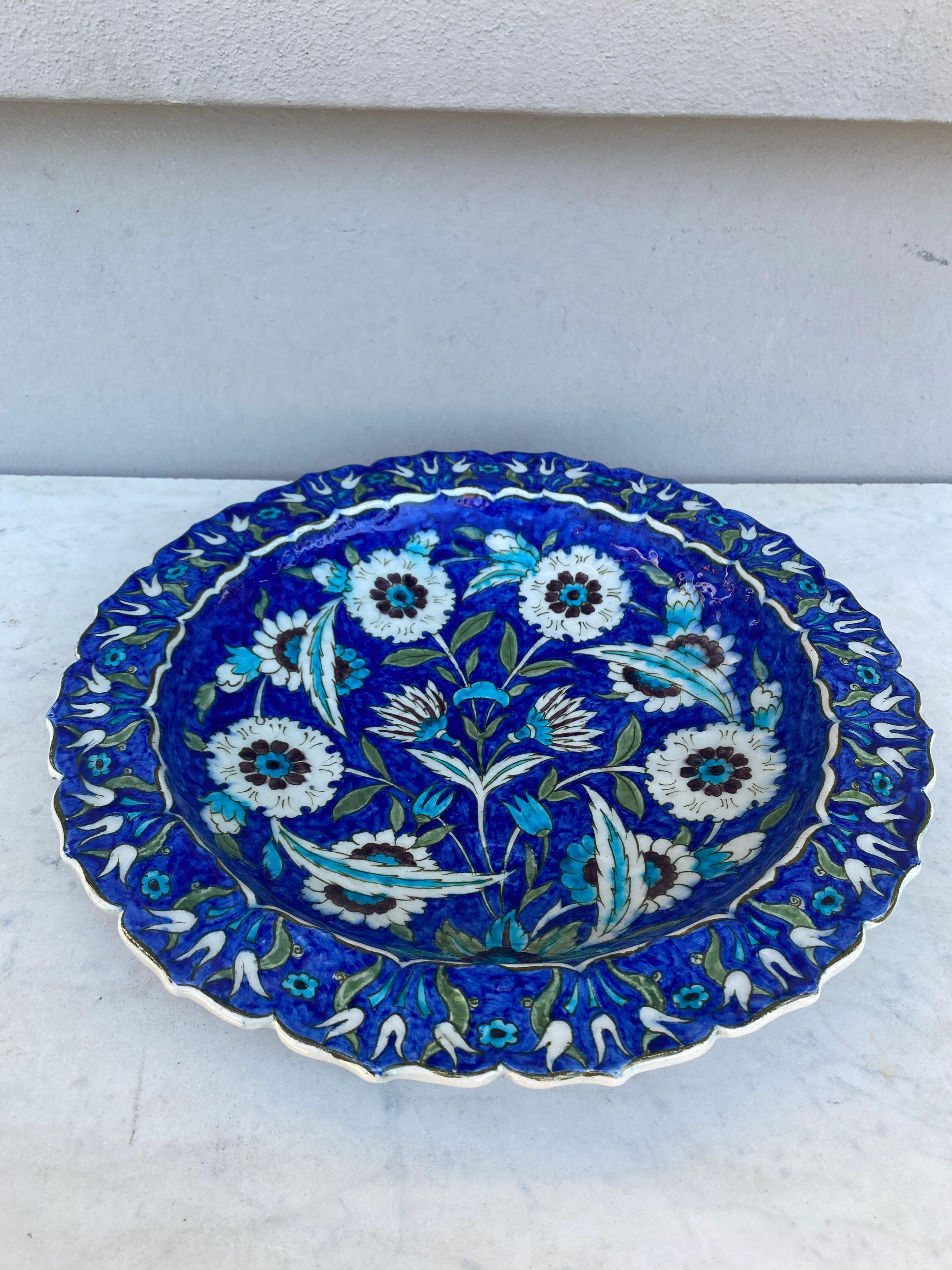 Large French Platter bowl signed Lachenal circa 1930.
Rare blue Iznik background with carnations.
Edmond Lachenal ( 1855 – 1948) was a French potter. He was a key figure in the French art pottery movement, and his works are held in many