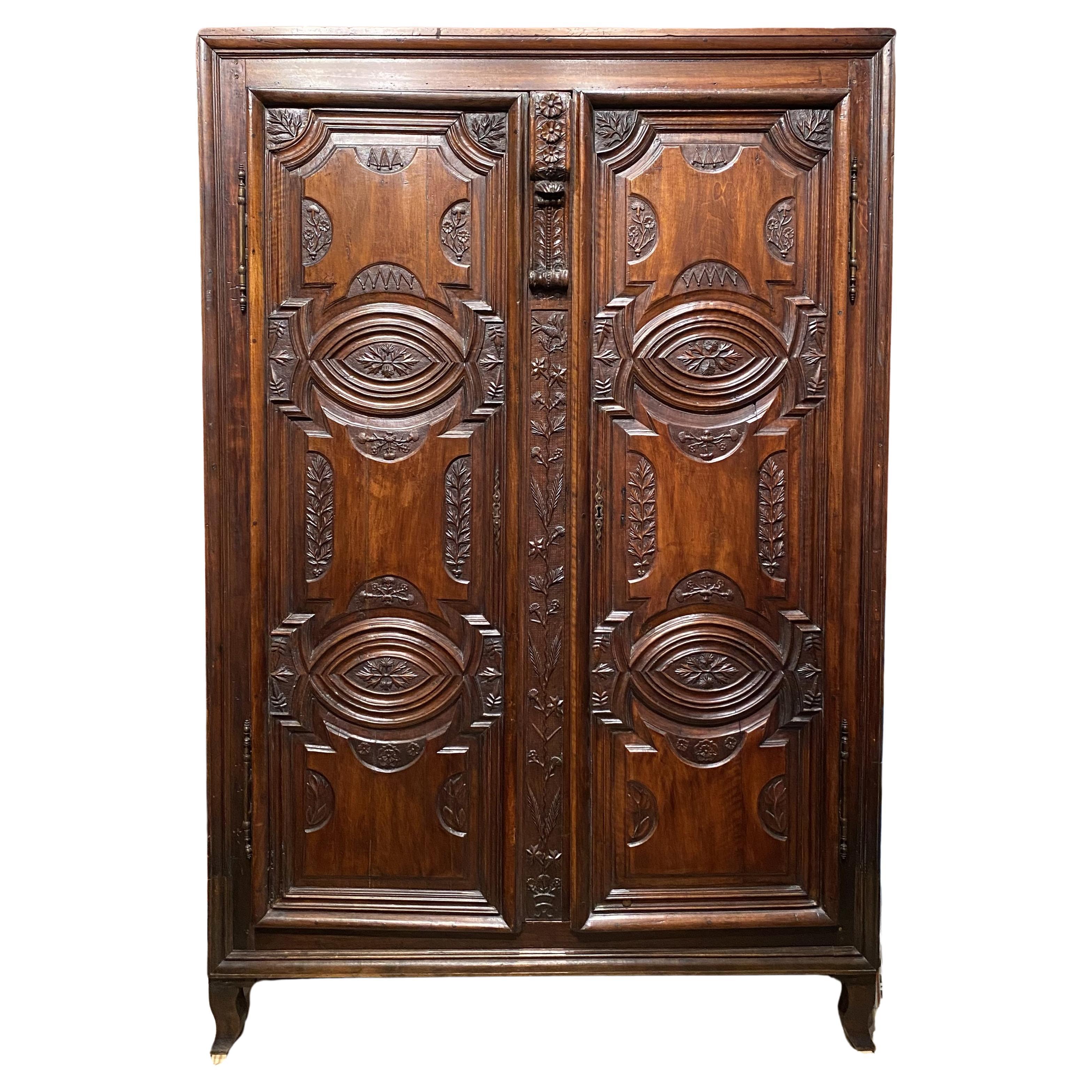 Large French Louis XIV Carved Walnut Two Door Cabinet with Restorations