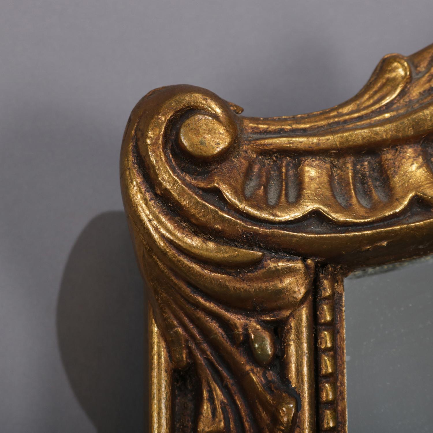 20th Century Large French Louis XV Giltwood Shaped and Foliate Wall Mirror, circa 1930