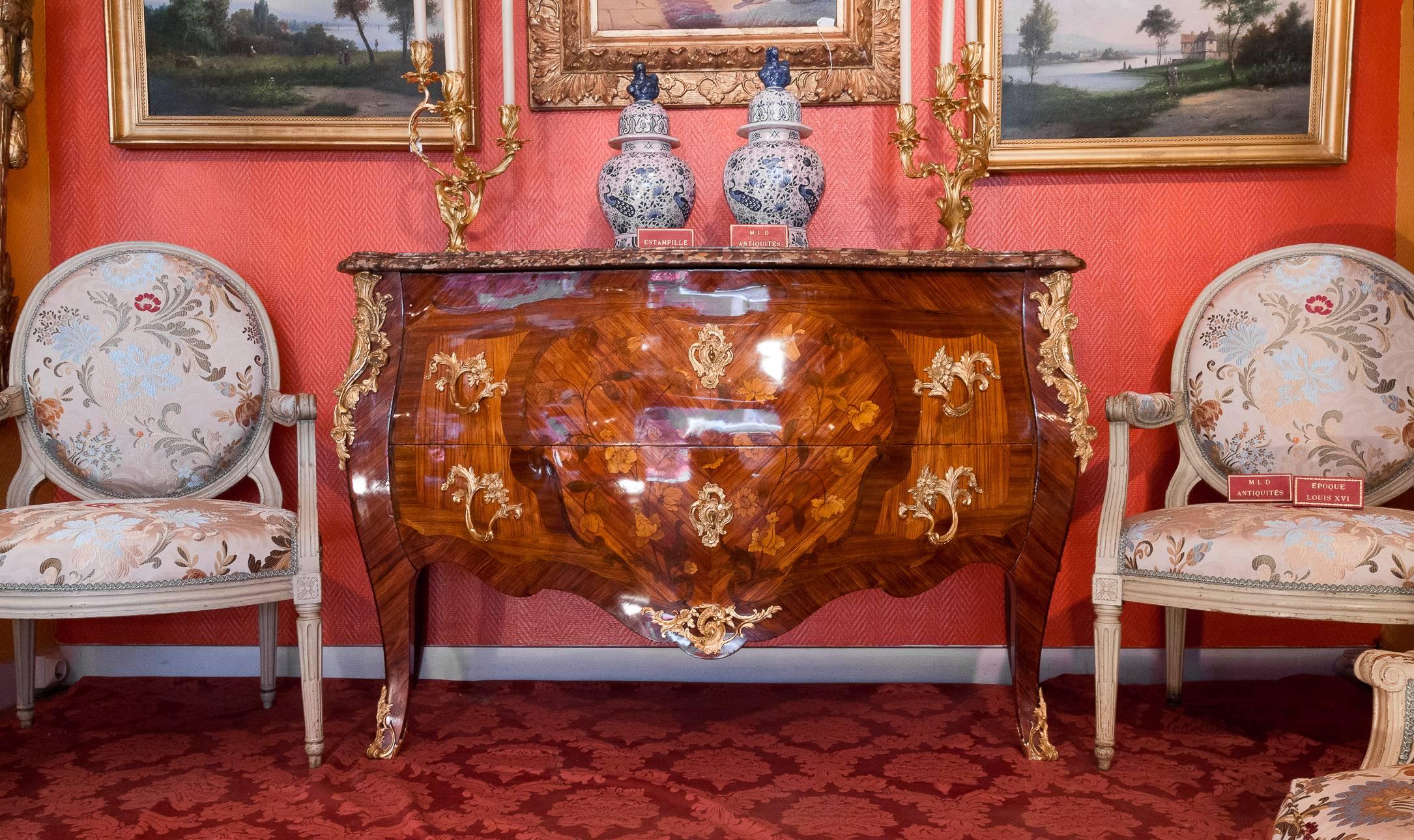 We are pleased to present you, a very high-quality French mid-19th century Louis XV style in tulipwood and kingwood commode with floral marquetry. Our beautiful chest raised on slender cabriole legs with front wrap around ormolu sabots. 
Above each