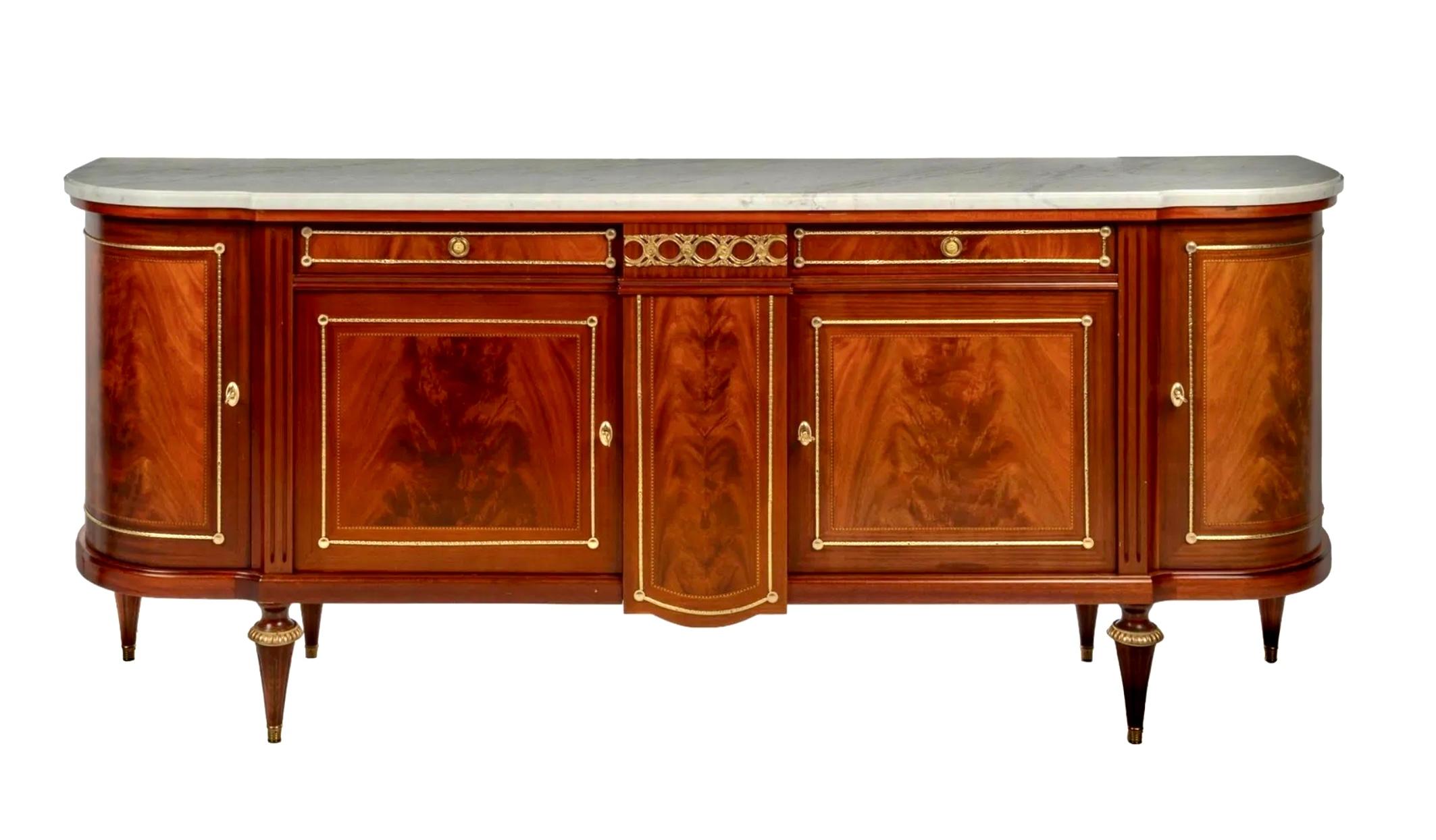 Large French Louis XVI Style Demilune Enfilade Sideboard Buffet featuring Carrara marble top over pair of drawers with gilt brass metal pulls, above pair of cabinet doors opening to interior storage, flanked by corner cabinets with curved doors,