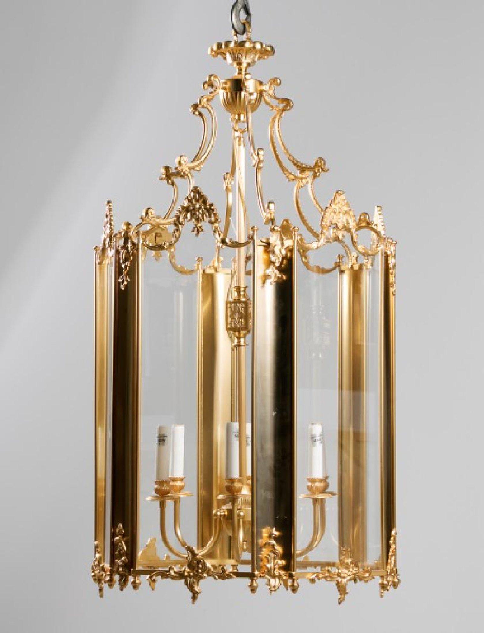 A large and impressive French Louis XVI style modern multi light gilt bronze and glass lantern chandelier of fine detail and quality.