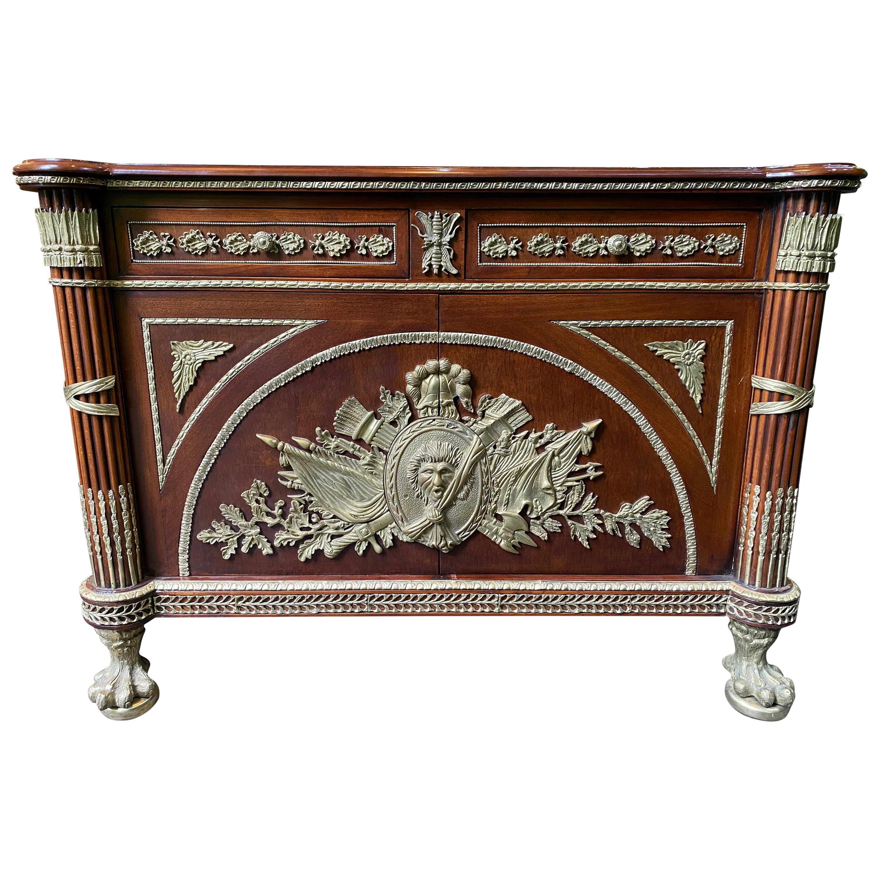 Large French Mahogany Empire Commode, Central Coats of Arms and Lion Paw Feet For Sale