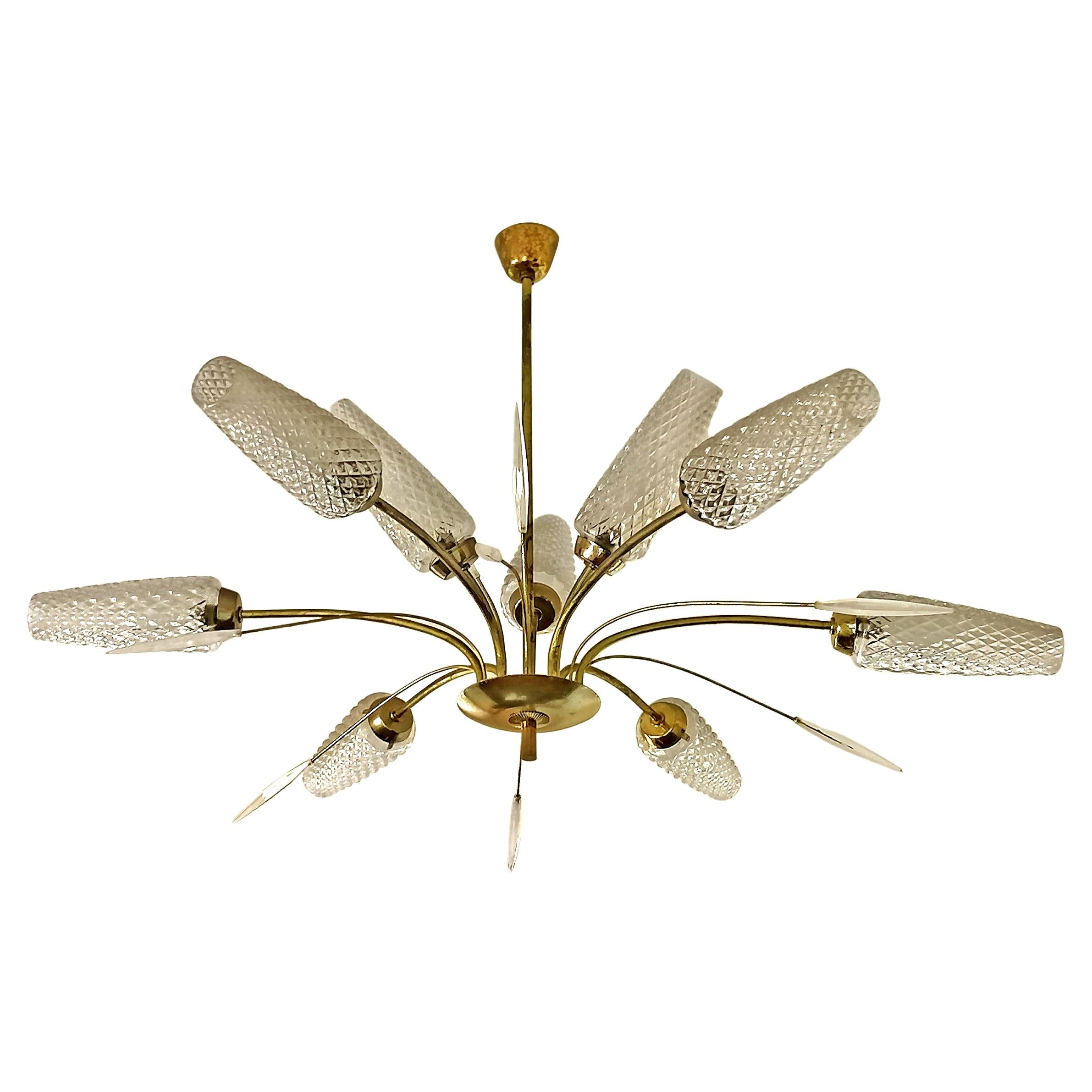 Large sculptural Mid-Century Modernist French Art Deco attributed to Maison Lunel. Gilt brass, metal and white Lucite Sputnik chandelier with 9 light/ circa 1950, Stilnovo Gio Ponti era. 