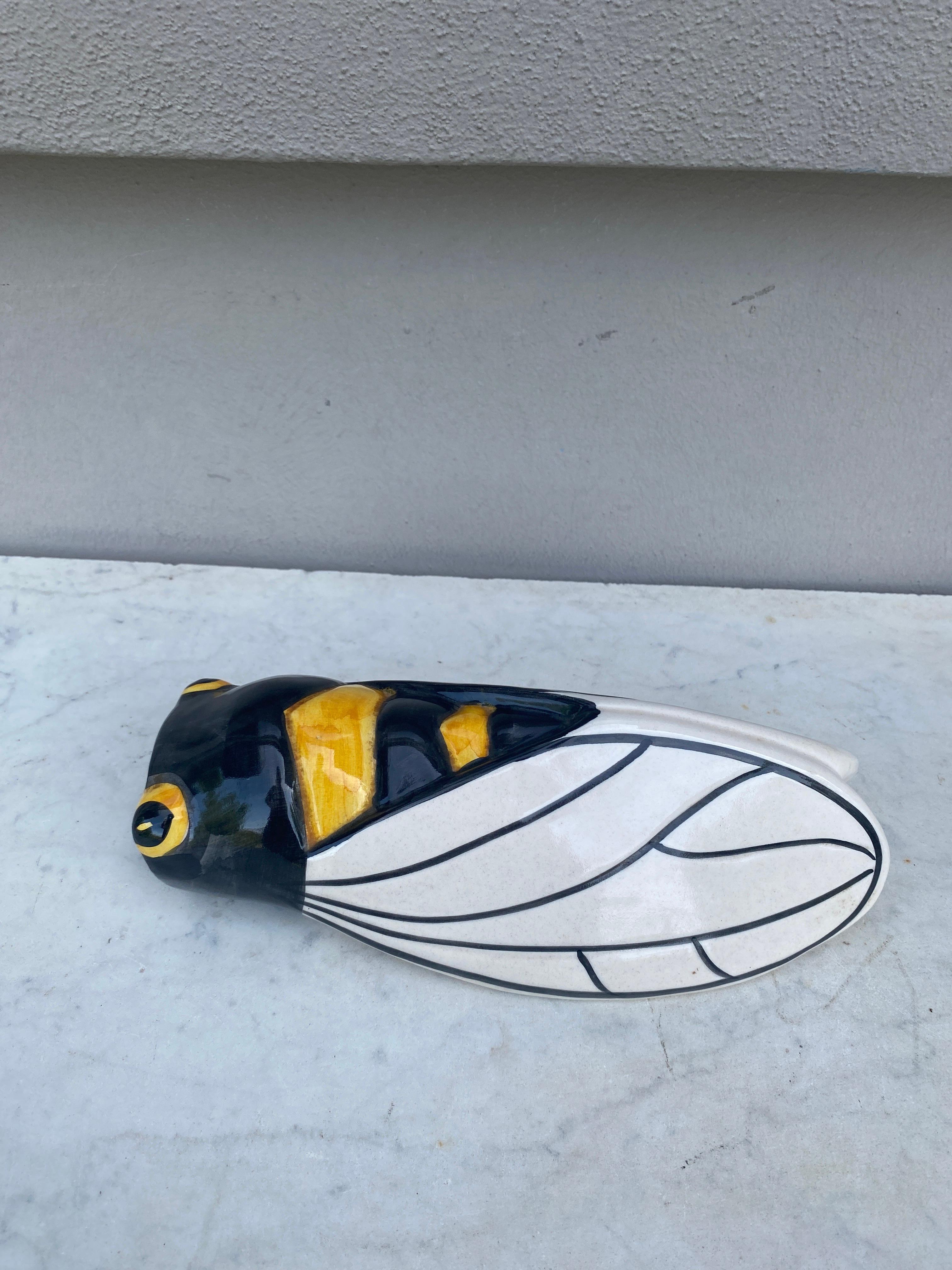 Large French Majolica cicada wall pocket signed Sicard from Provence.
Measures: Height / 10 inches.