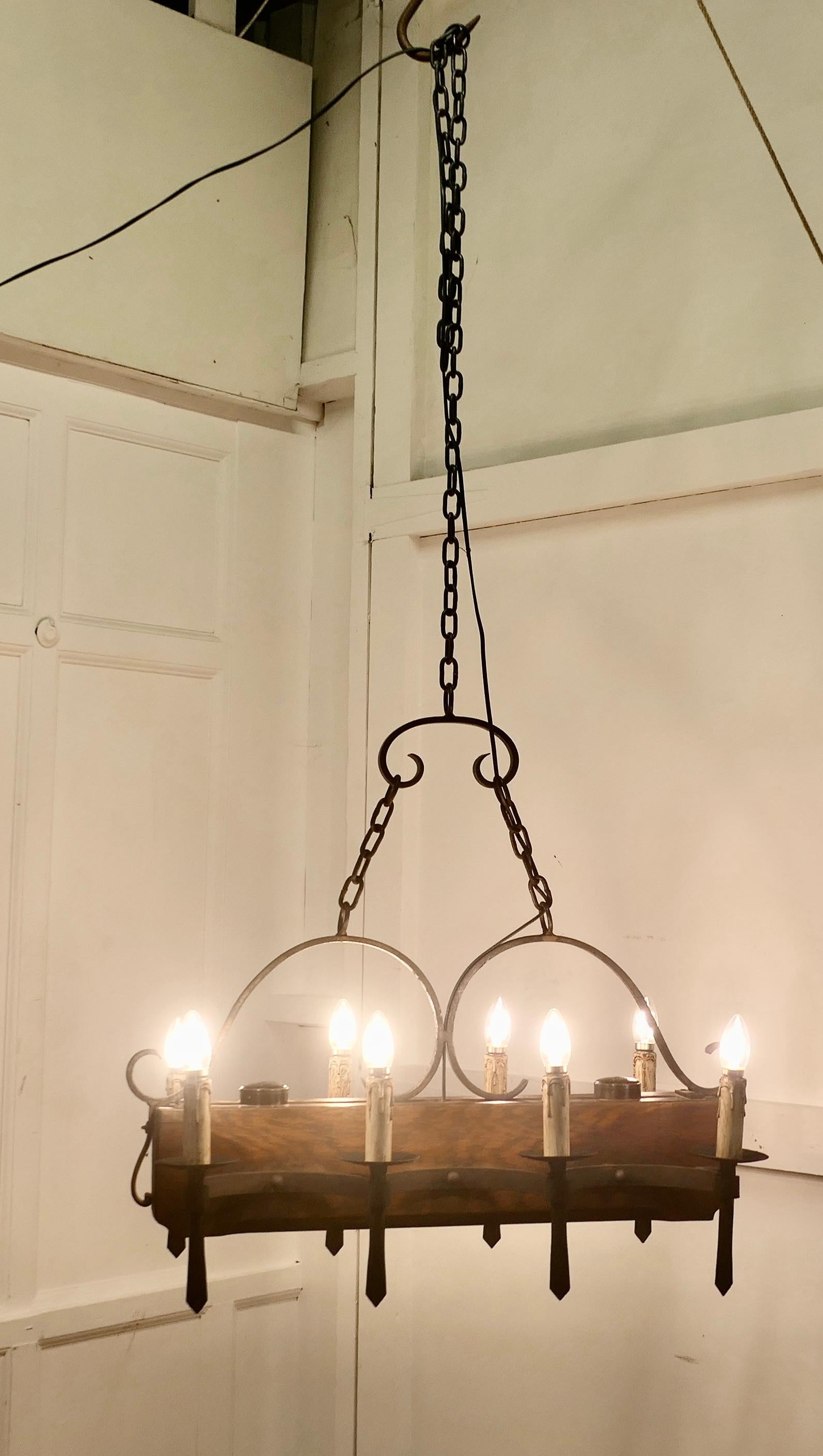 Mid-20th Century Large French Medieval Rustic Chandelier For Sale