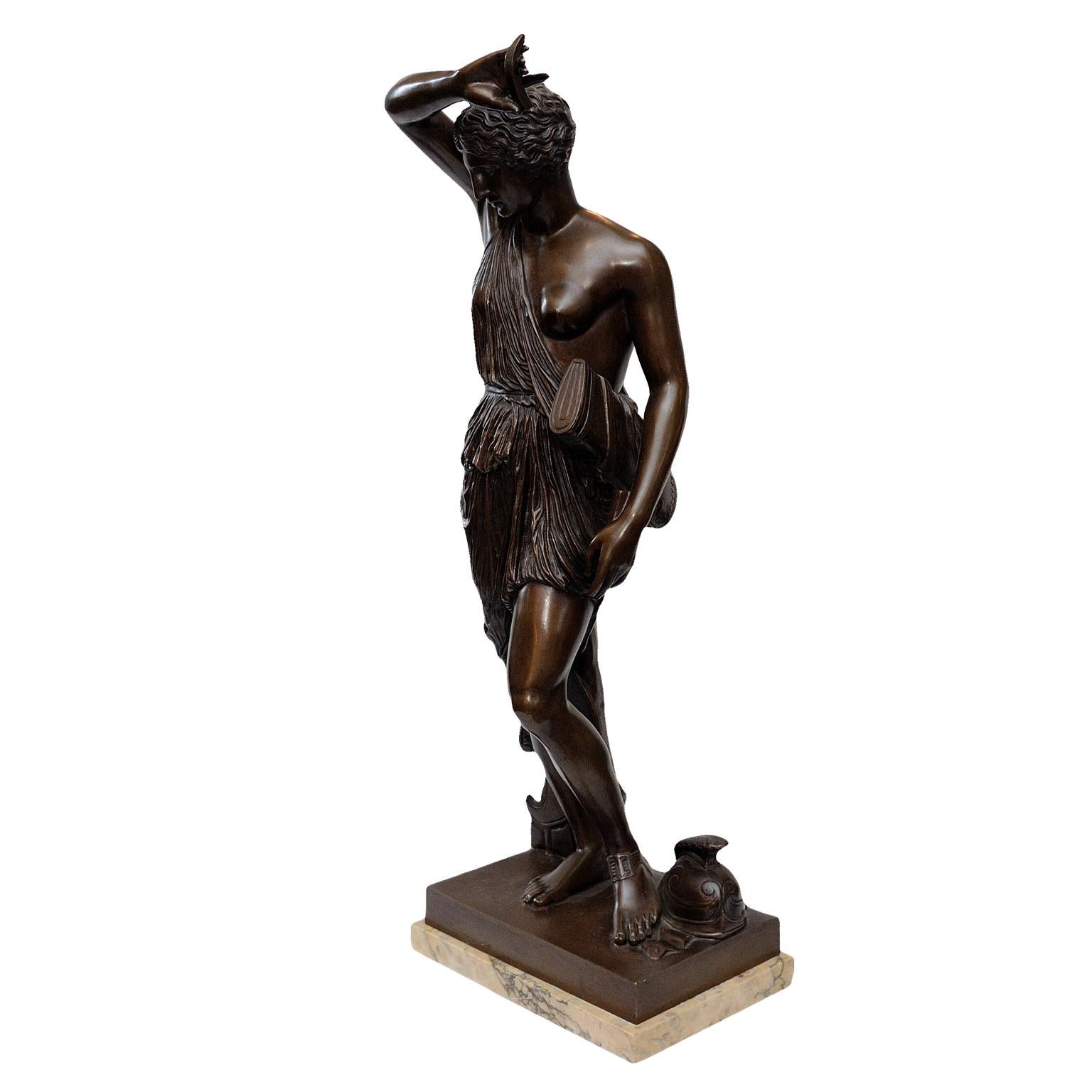 This is a fine large French mid-19th century bronze classical figure by the renowned Paris foundry 
F. Barbedienne. Standing on a sienna marble base, circa 1850.