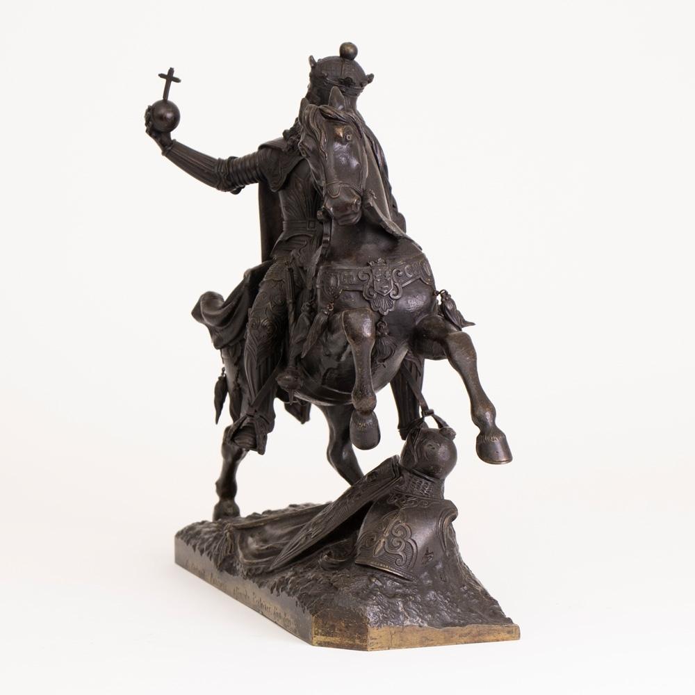 Large French mid-19th century bronze knight on horseback
Circle of Jean-François Théodore Gechter (1796-1844), a French equestrian bronze of Charlemagne, mid-19th century, the King in full armour holding aloft an orb, the naturalistic base with