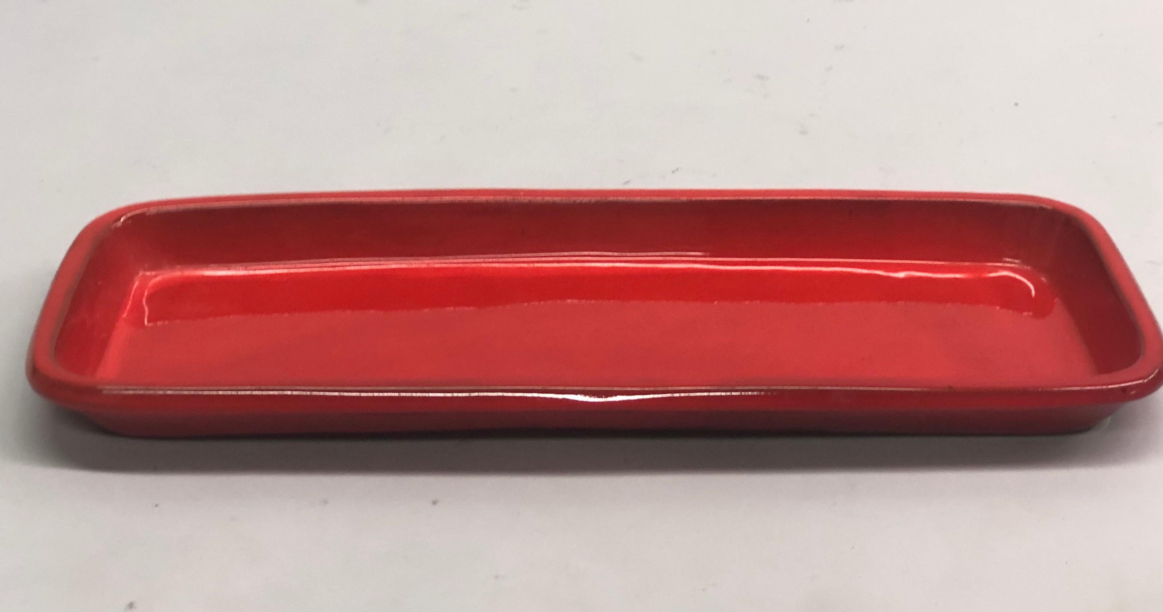 Very large French Mid-Century Modern rectangular, red ceramic serving platter or tray handmade by Voltz, Vallauris. Signed on reverse, Voltz, Vallauris, France.

A large oval red ceramic platter by Voltz is also available at additional cost. See
