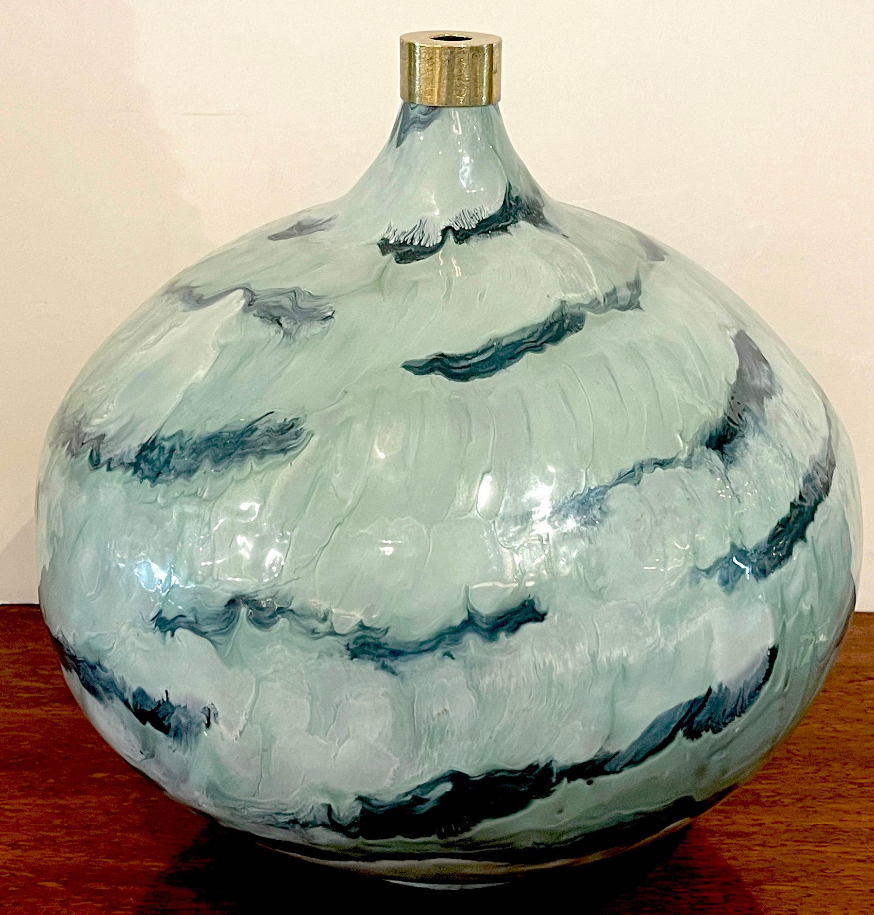 Large French Modern blue & white enameled gourd vase, 
With Bronze top, the tapering body profusely enameled in subtle shades of blue and white, unsigned. 
Overall measurements:
17-Inches high x 14.5-Inch diameter x 3.75-Inch base.
 