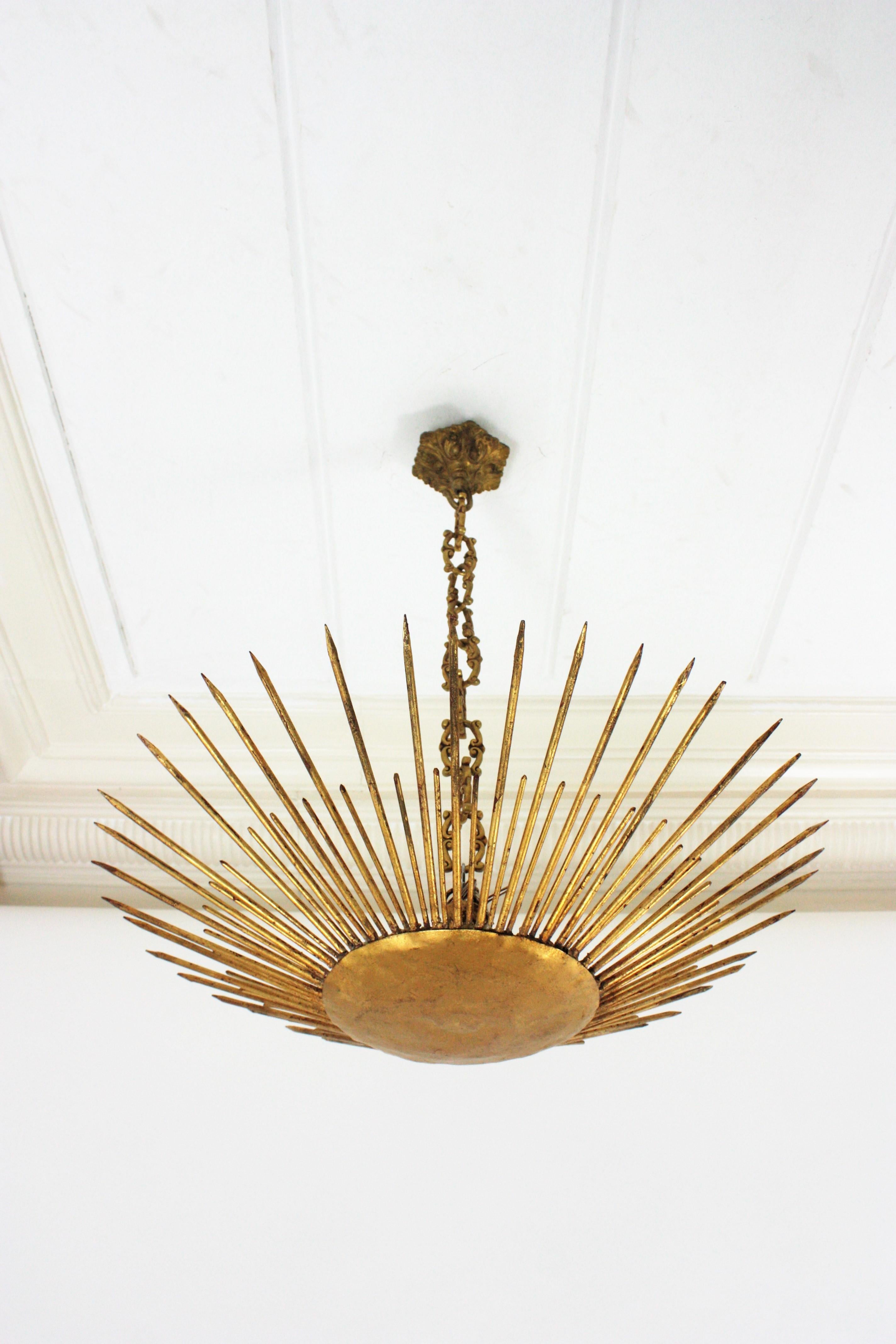 Large French Modern Neoclassical Sunburst Pendant Flush Mount, Gilt Iron, 1940s In Good Condition In Barcelona, ES