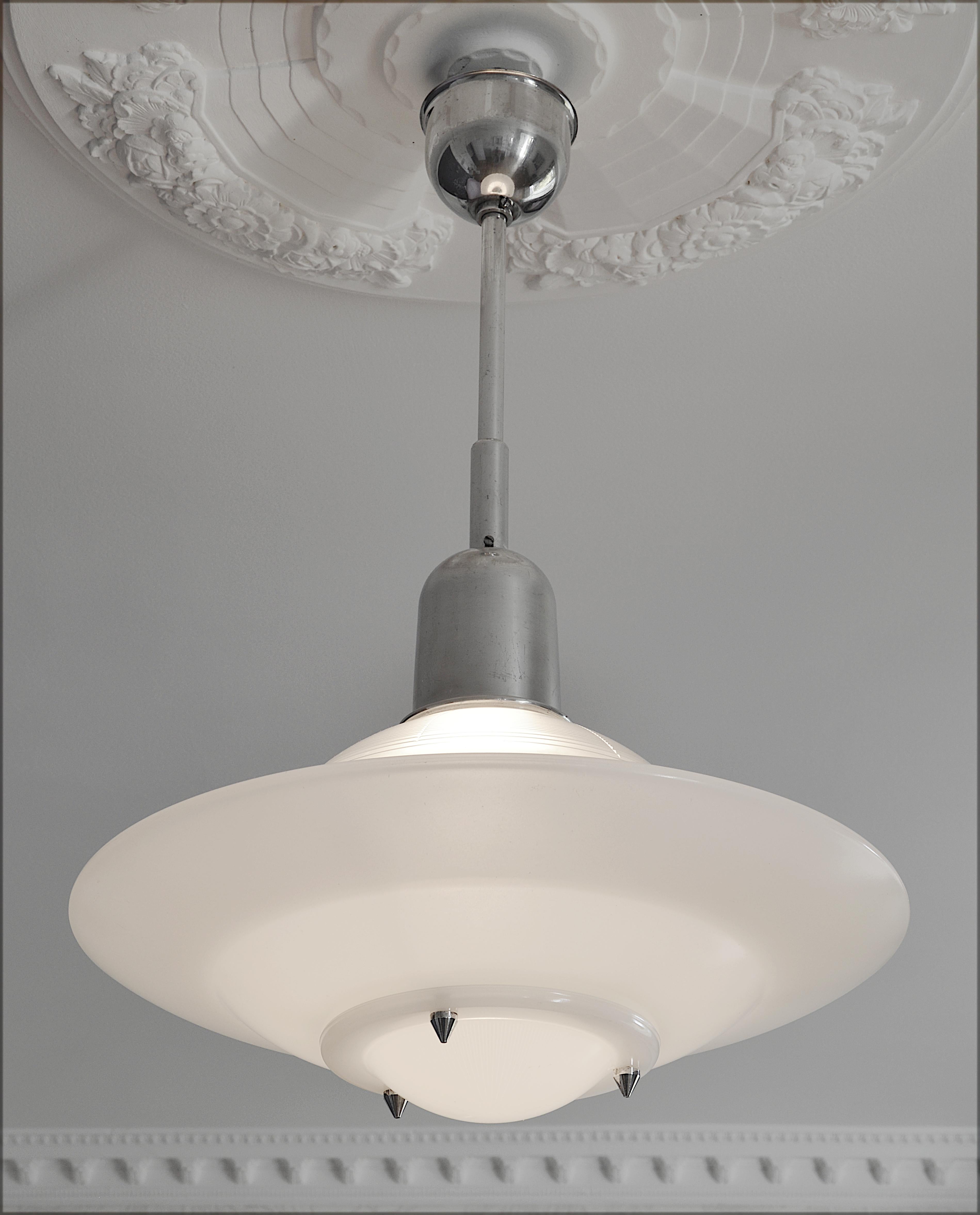 French modernist Art Deco pendant chandelier, France, 1930s. Milk glass lower shade. Large and heavy. Measures: Height 27.5