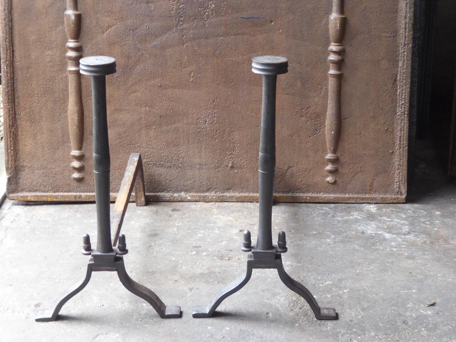 Large 19th-20th century French Napoleon III style andirons. The andirons are made of wrought iron and have a black / pewter patina. The condition is good.







   