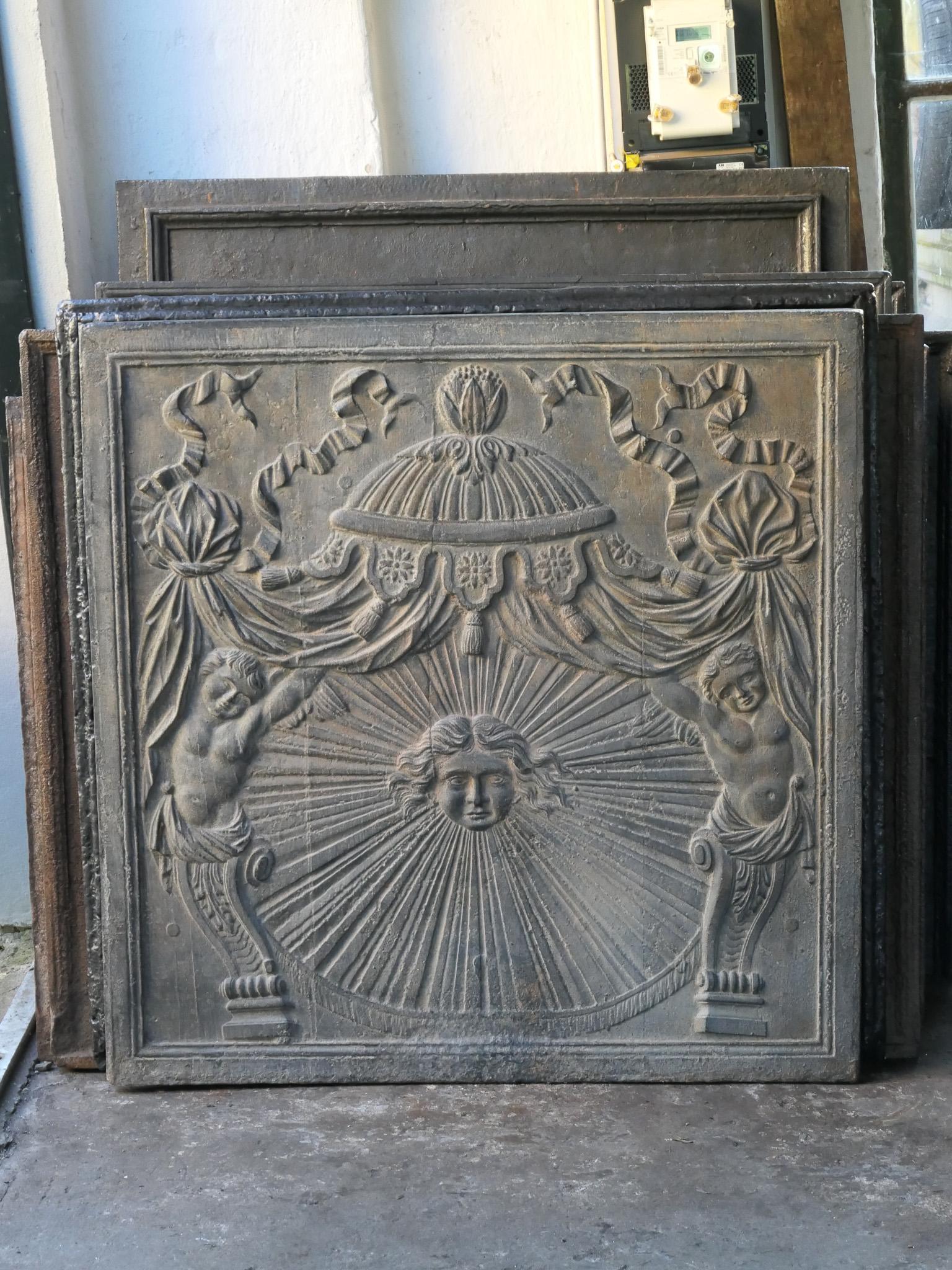 Cast Large French Neoclassical 'The Sun' Fireback / Backsplash, 18th - 19th C. For Sale