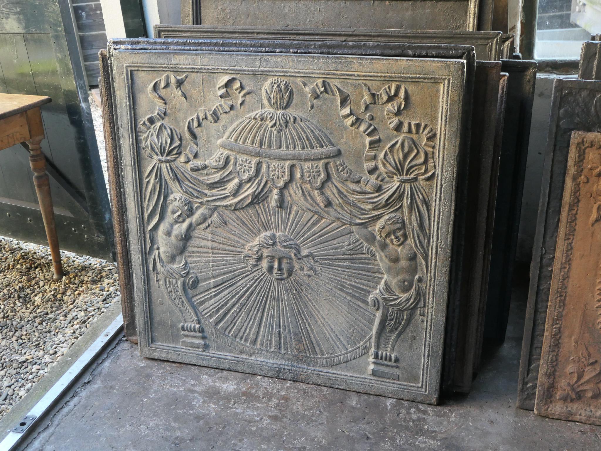 Iron Large French Neoclassical 'The Sun' Fireback / Backsplash, 18th - 19th C. For Sale
