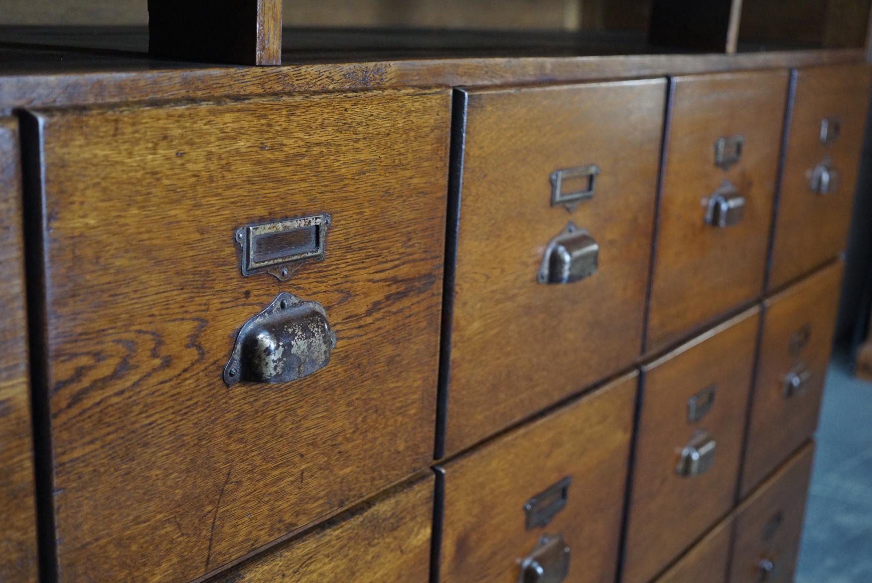 Mid-20th Century Large French Oak Apothecary Cabinet, 1930s