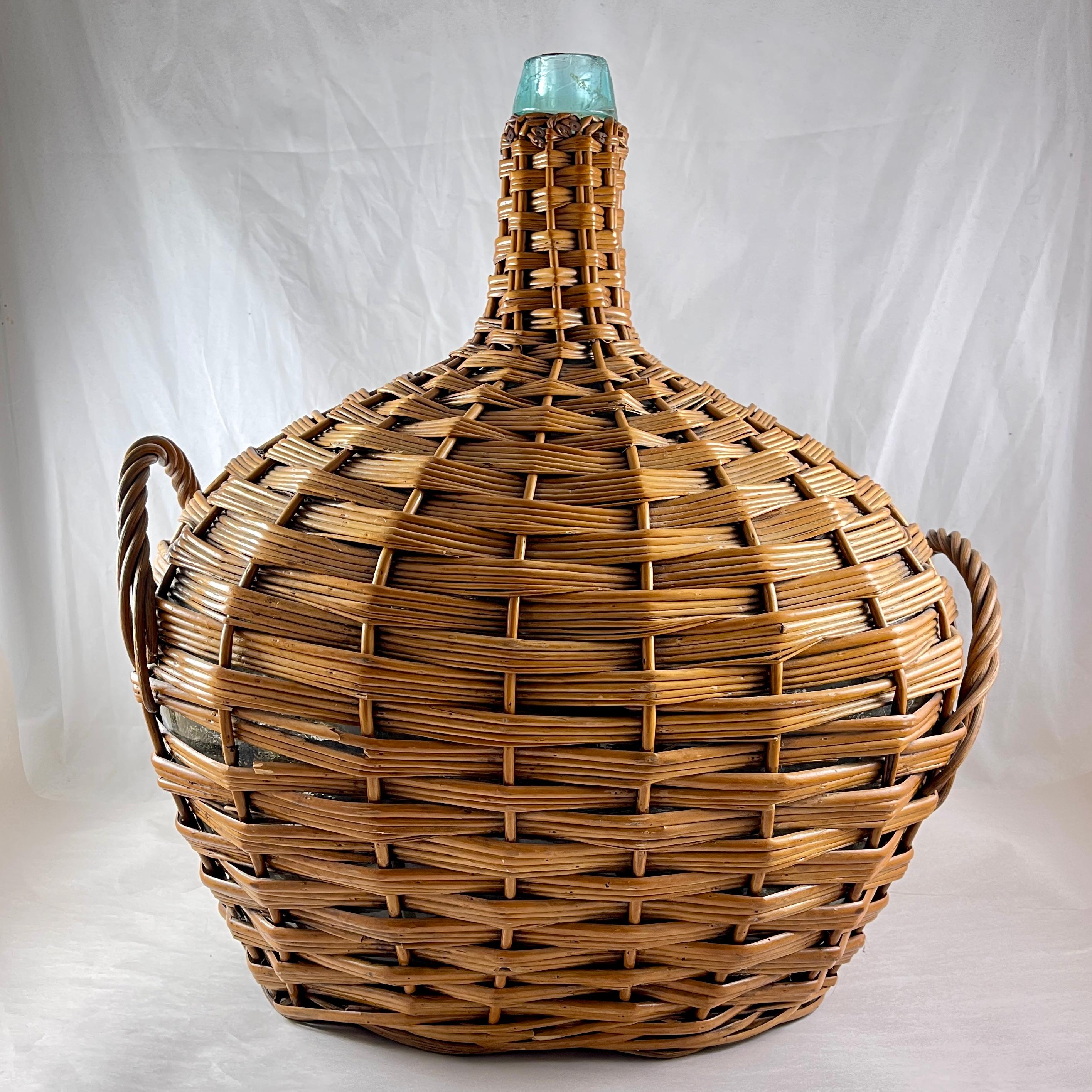 Hand-Crafted Large French Oval Wicker Clad Blown Aqua Glass Carboy or Demijohn, circa 1900 For Sale
