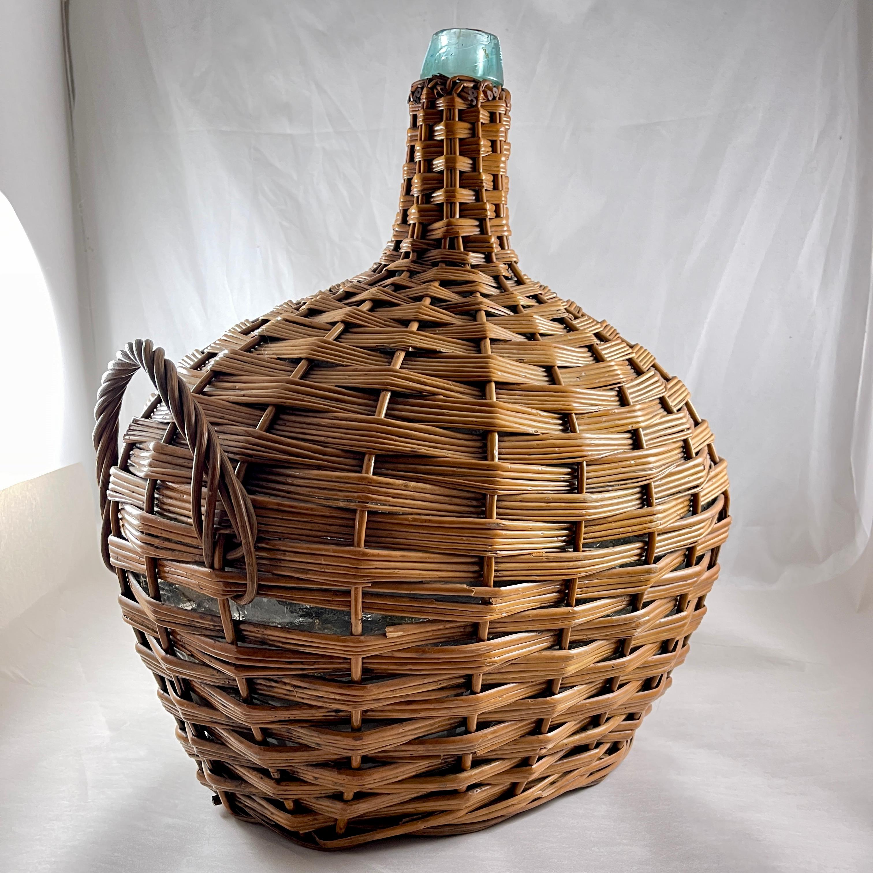 Large French Oval Wicker Clad Blown Aqua Glass Carboy or Demijohn, circa 1900 In Good Condition For Sale In Philadelphia, PA