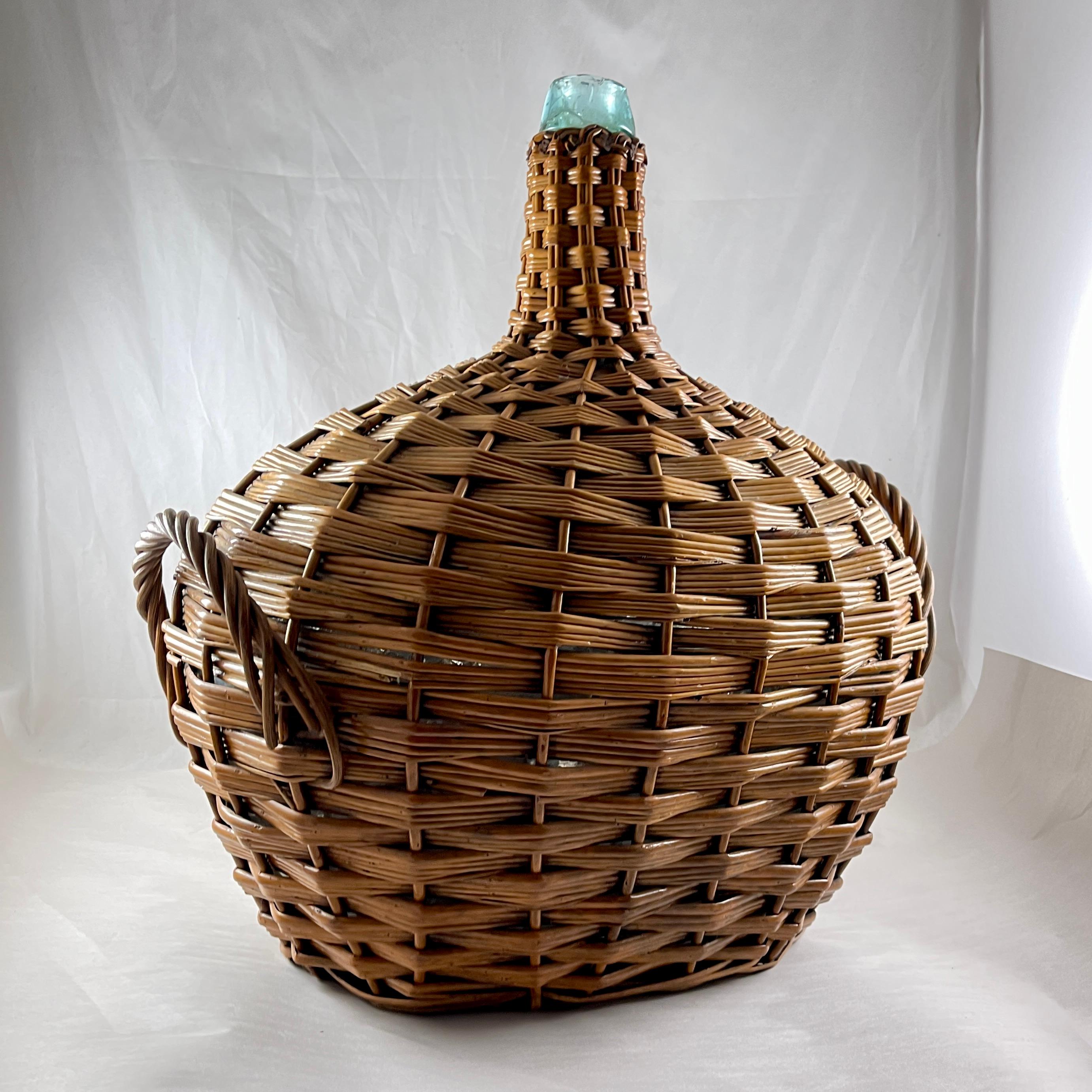 20th Century Large French Oval Wicker Clad Blown Aqua Glass Carboy or Demijohn, circa 1900 For Sale