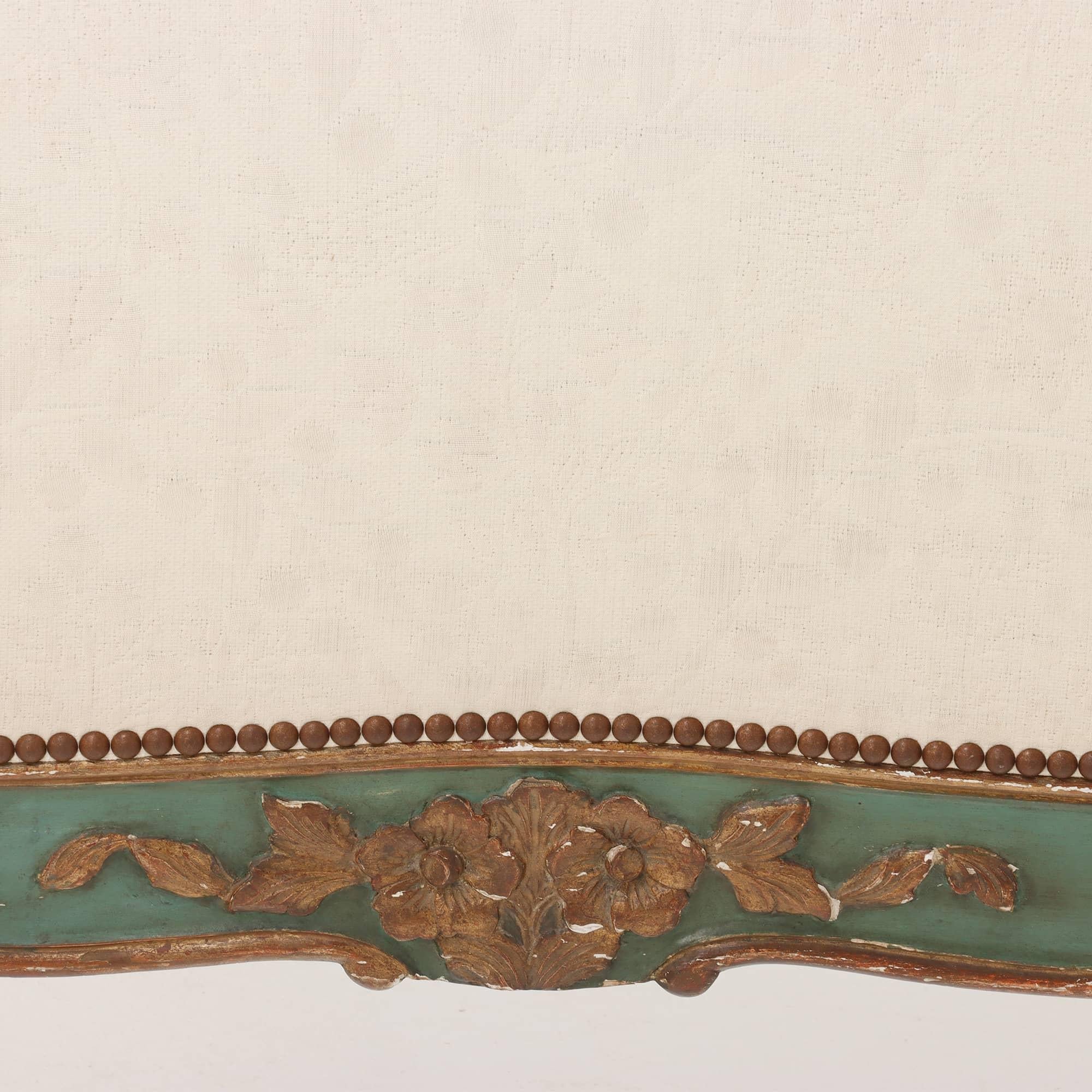 Early 20th Century Large French painted and gilt carved daybed C 1900.
