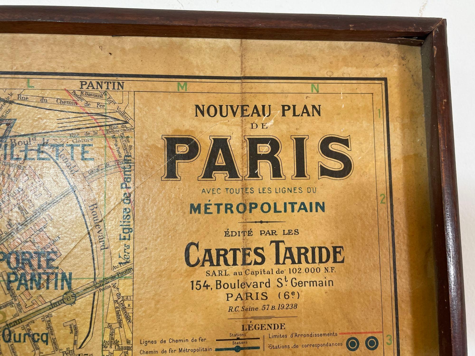 Large French Paris Metro Map 1960s.
A large Vintage French framed map of the Parisian Metro from the mid-20th century.
Featuring a Paris metro map from the midcentury period showing a nicely worn patinated appearance, the map depicts the metro and