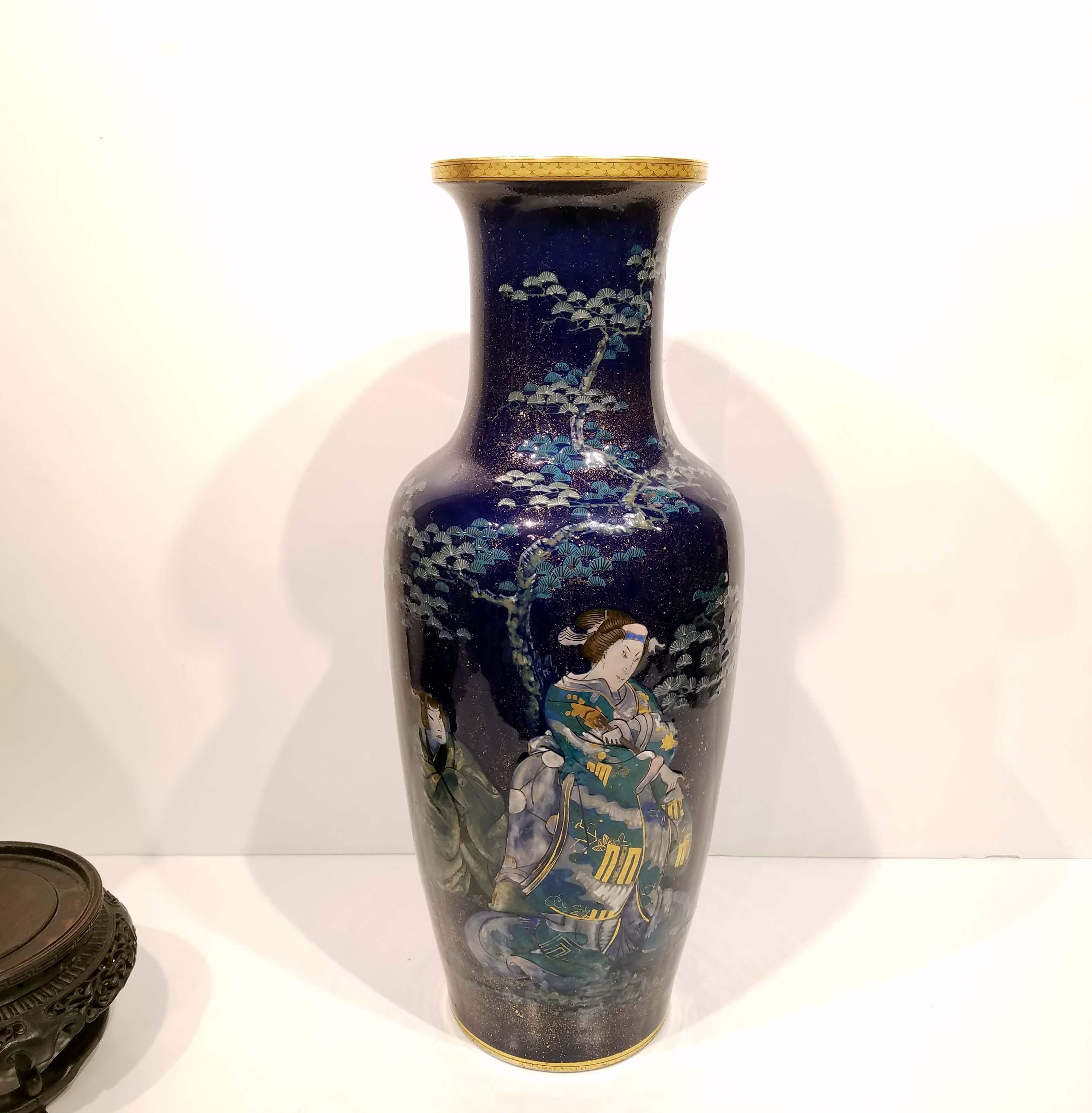 Large Pate Sur Pate Japonisme vase marked C. P. & Co. Mehun. (Charles Pillivuyt Co.) circa late 19th century with cobalt background with gold sparkles that resembles lapis lazuli and two japanese figures in kimonos in pate sur pate enamel. This is a
