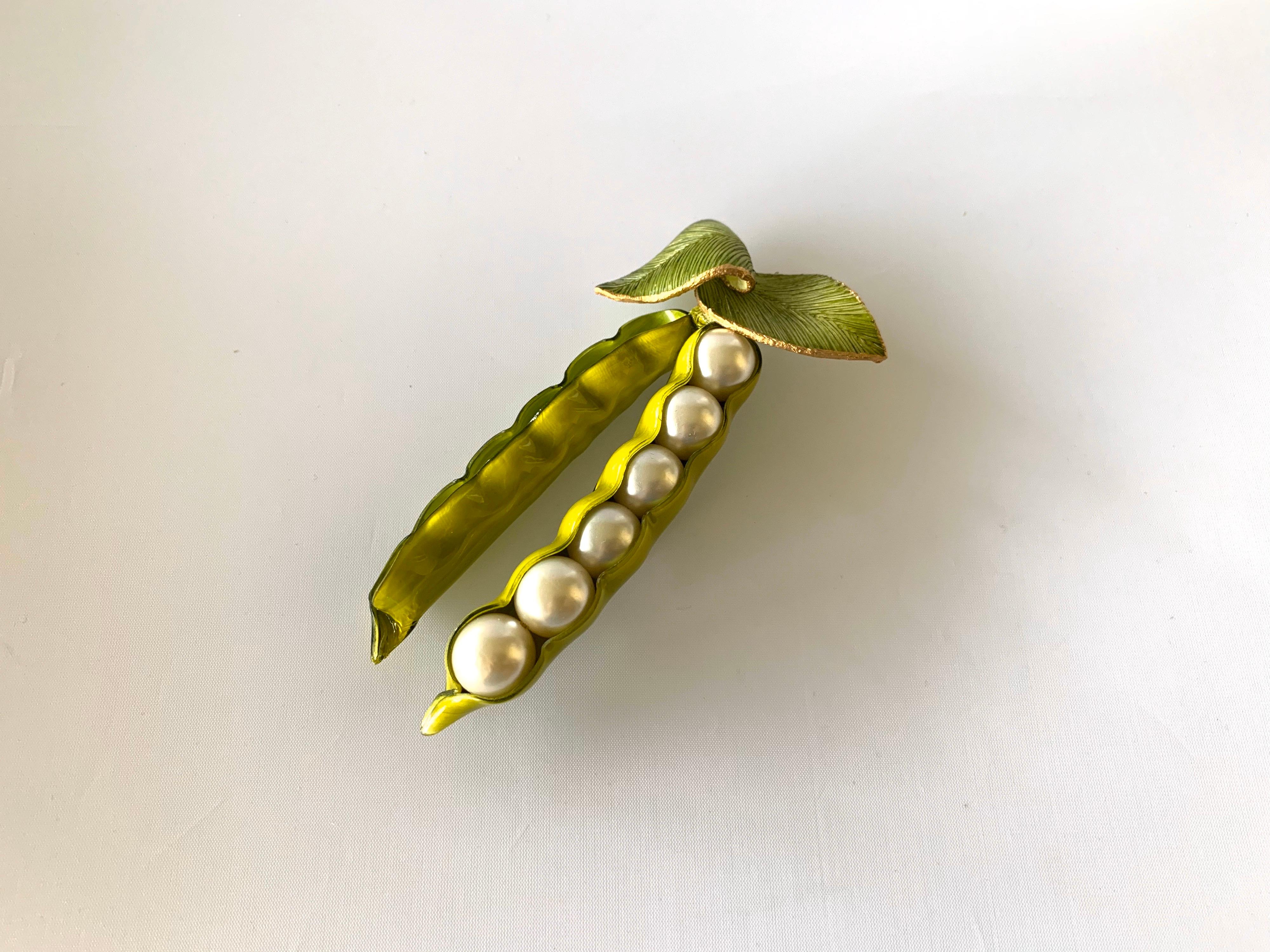 XL  contemporary French pea-pod brooch/pin handcrafted by Cilea Paris. The large brooch/pin is handcrafted and detailed out of resin and enamel and features six large faux white pearls in the center. Signed on the back.