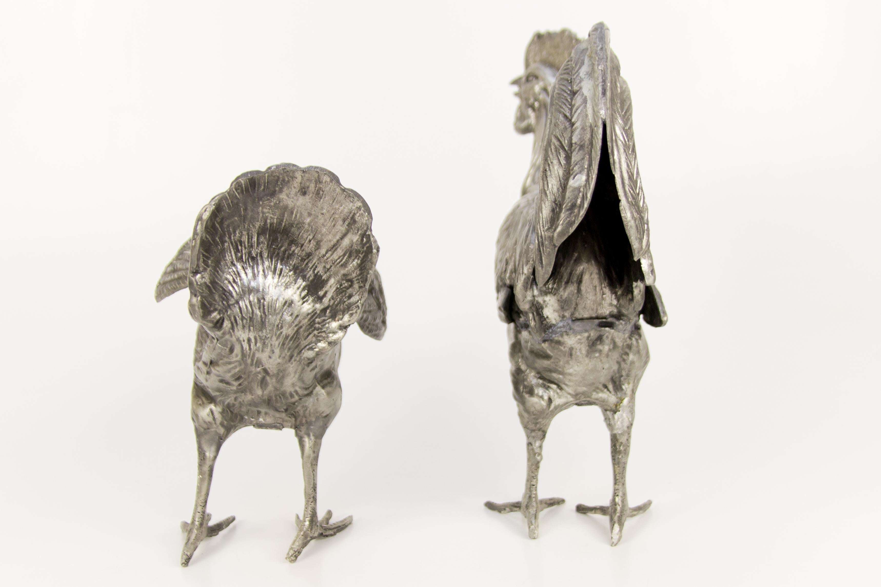 large metal chicken sculpture