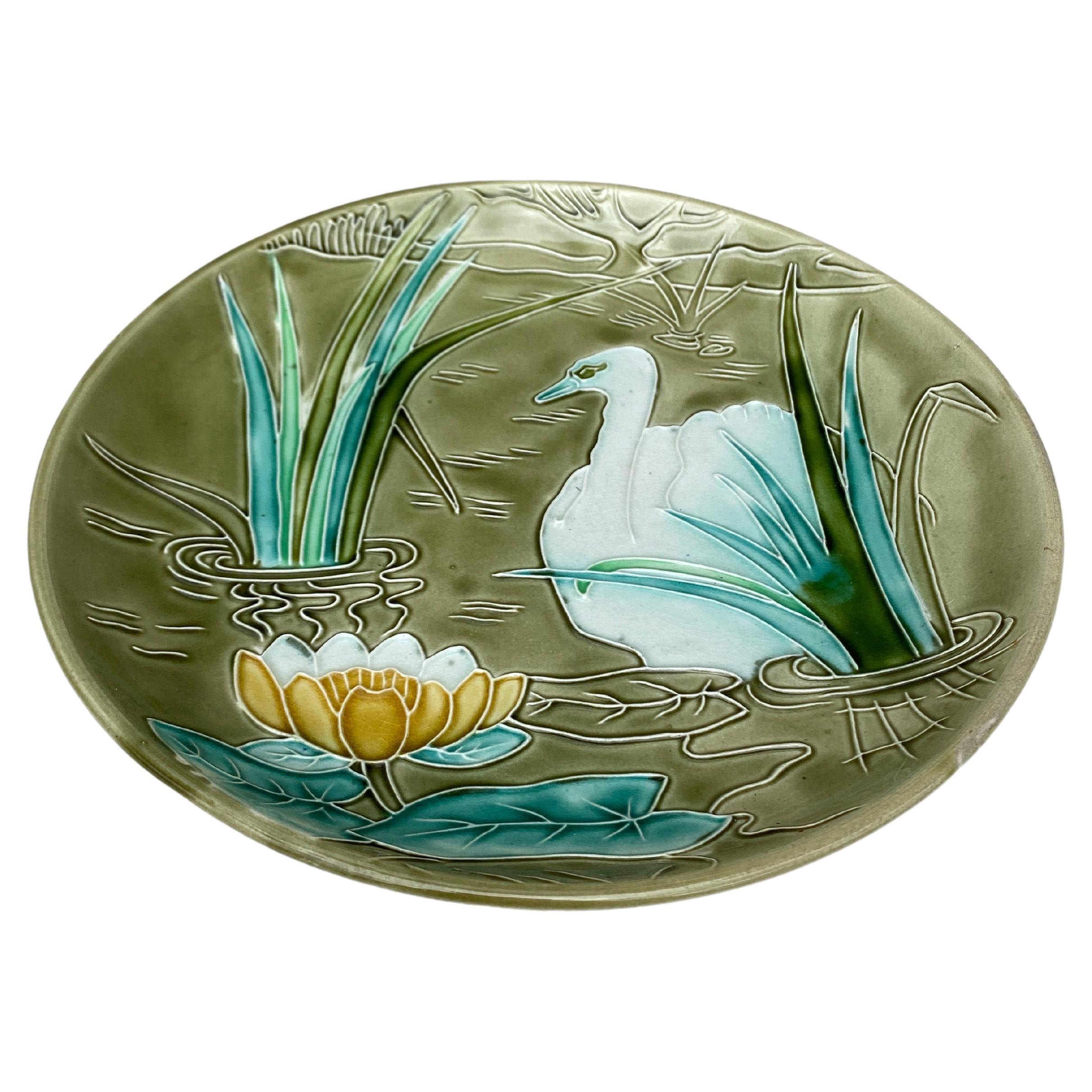 Large French Majolica platter swan in a pond with water lily Orchies Circa 1900.