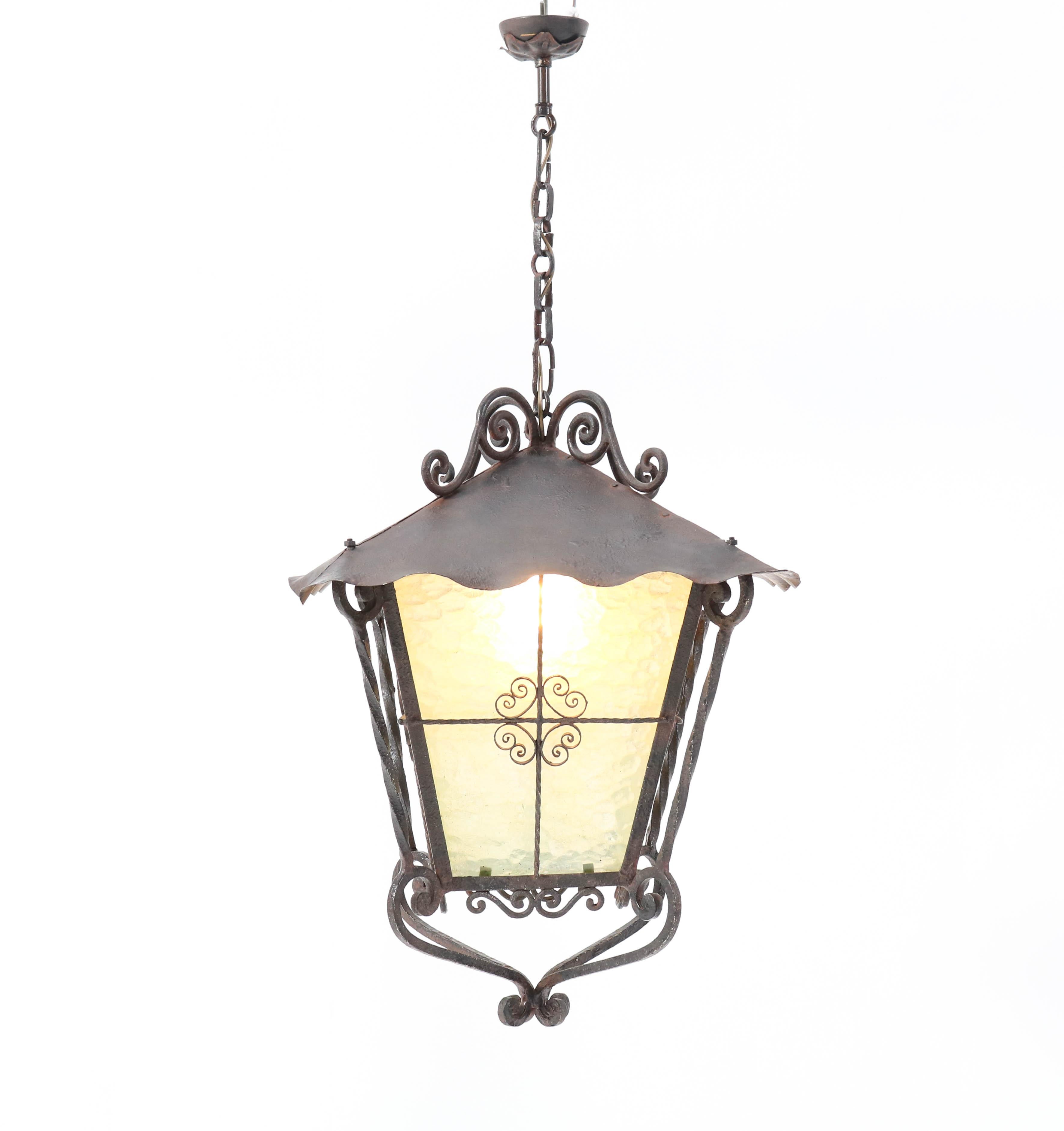 Stunning and large French Provincial lantern.
Striking French design from the 1950s.
Wrought iron frame with original hand blown glass panels.
Rewired with one socket for E-27 light bulb.
In very good condition with minor wear consistent with