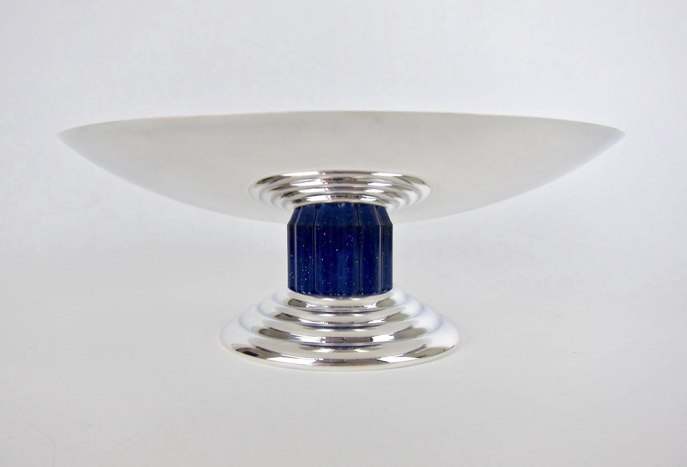 A large and elegant Art Deco silver plate compote or tazza dish on a stepped base with a contrasting ribbed stem of imitation blue hardstone (lapis lazuli). Jean E. Puiforcat designed this object in the 1930s for renowned silversmiths Puiforcat of