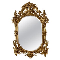 Large French Régence Giltwood Beveled Mirror Hand-Carved Vases & Birds Cresting