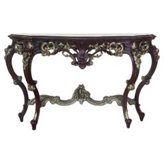 Großer Konsolentisch aus geschnitztem Nussbaumholz im französischen Regency-Stil mit vergoldeten Details und Marmor