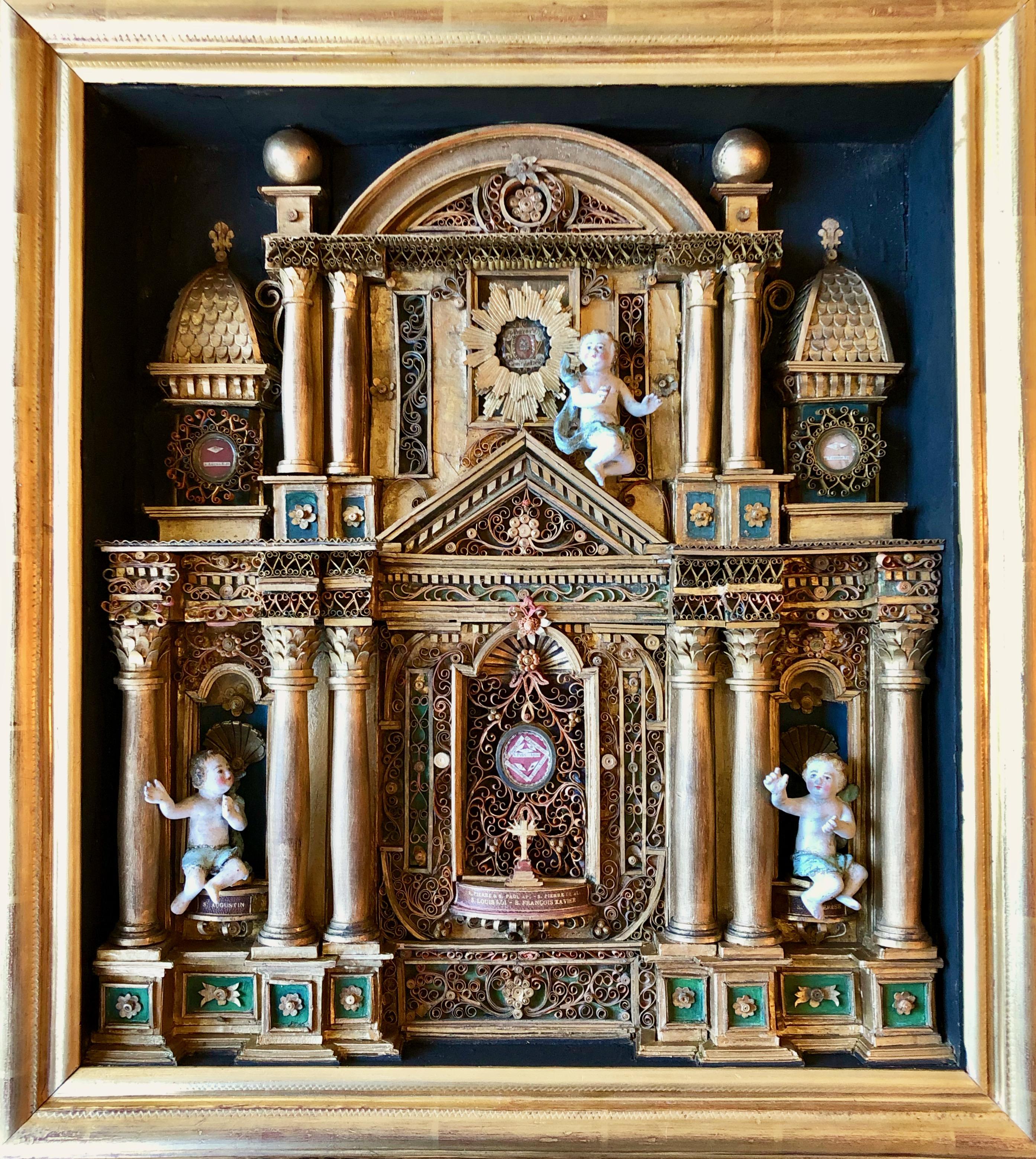 This is an absolutely gorgeous 19th century French reliquary (reliquary is also referred to as a shrine) and includes relics of 4 Saints-St Cam. de Leffis, S. Augus. E.D., S. Teresiae Vr, S. Petri Apostle's., S. Pauli Ap., S. Ludovic Reg., S. Franc.