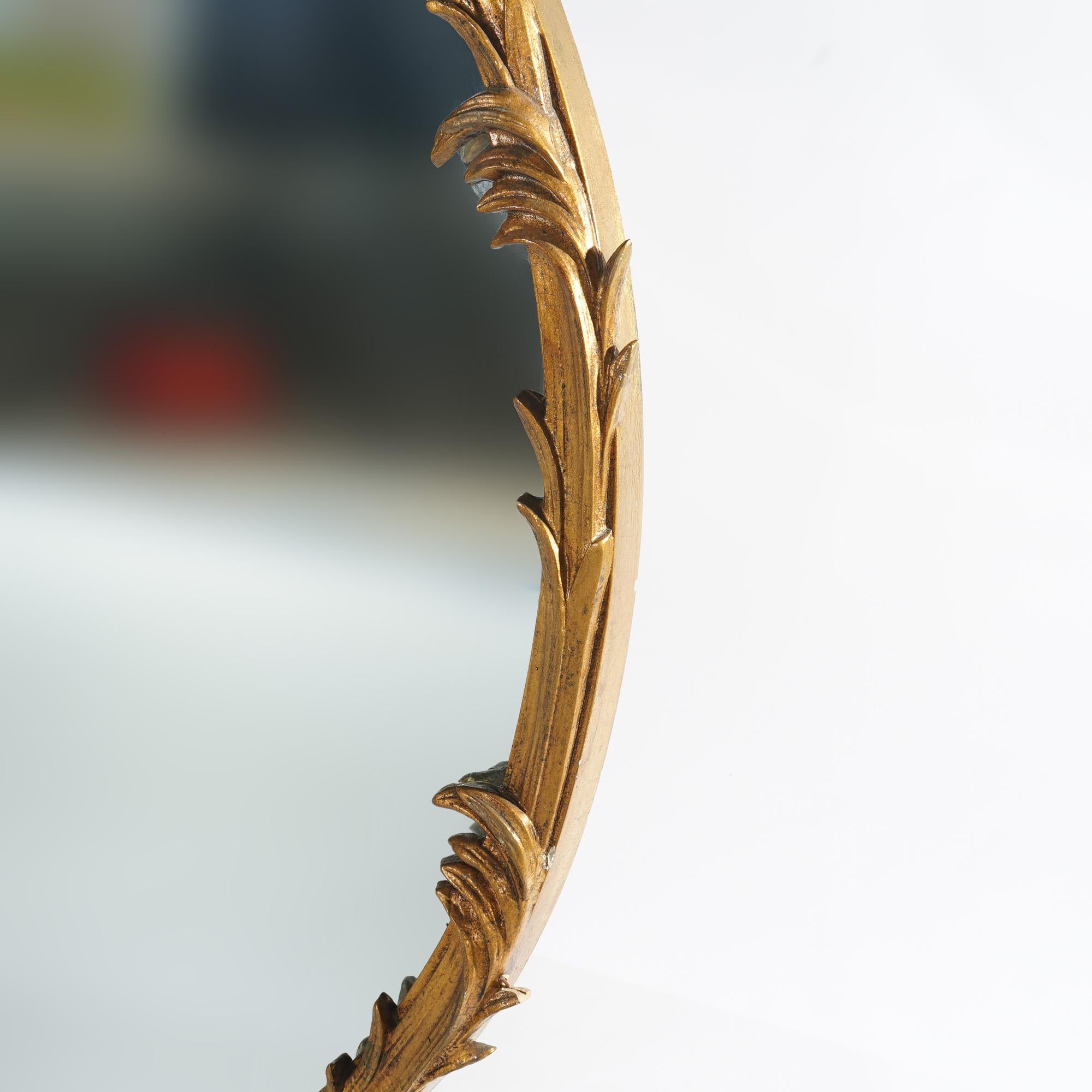 Grand miroir rococo français double ovale en bois doré à volutes et à feuilles, 20ème siècle en vente 2