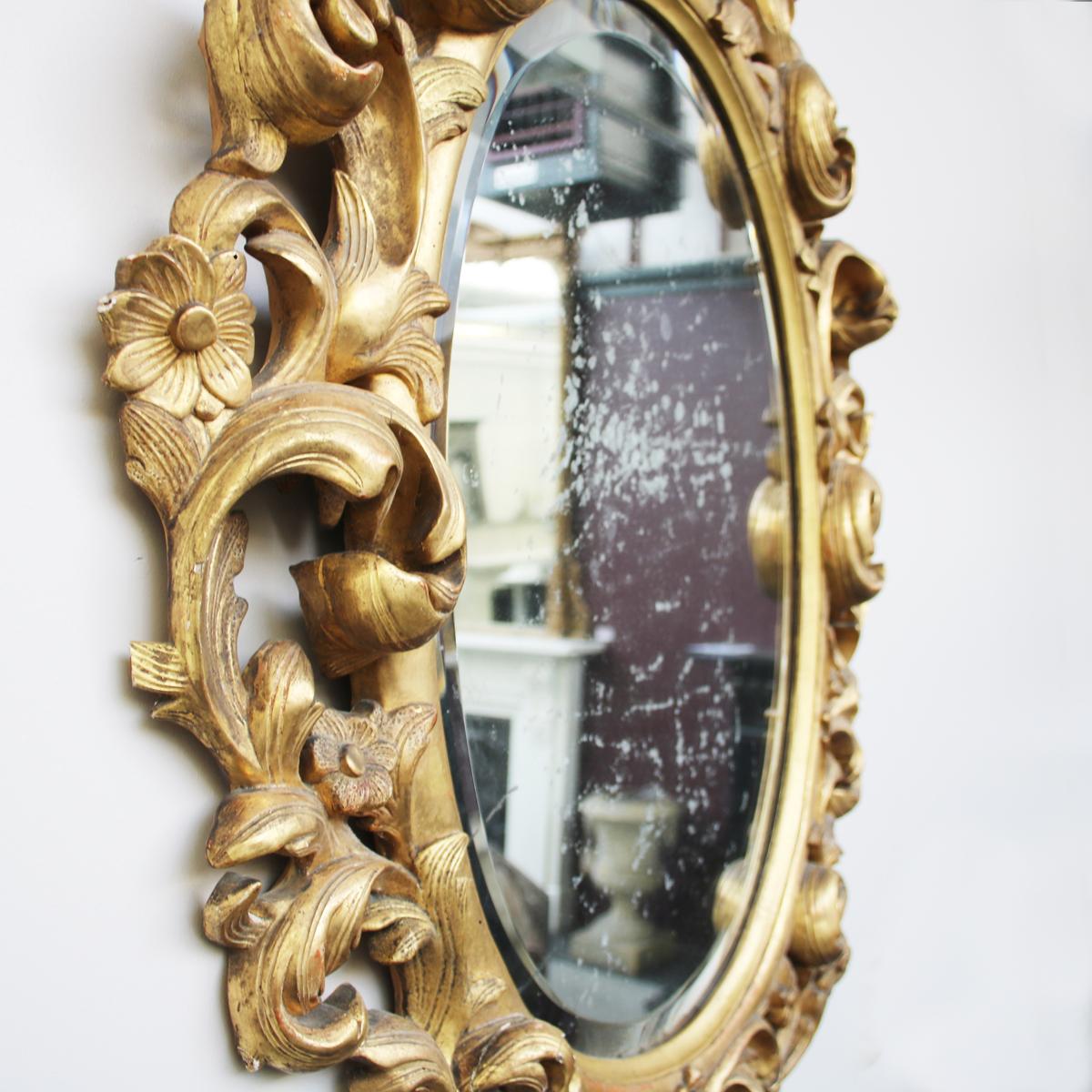 Large French Rococo Gilded Carved Wood Oval Wall Mirror In Fair Condition In Manchester, GB