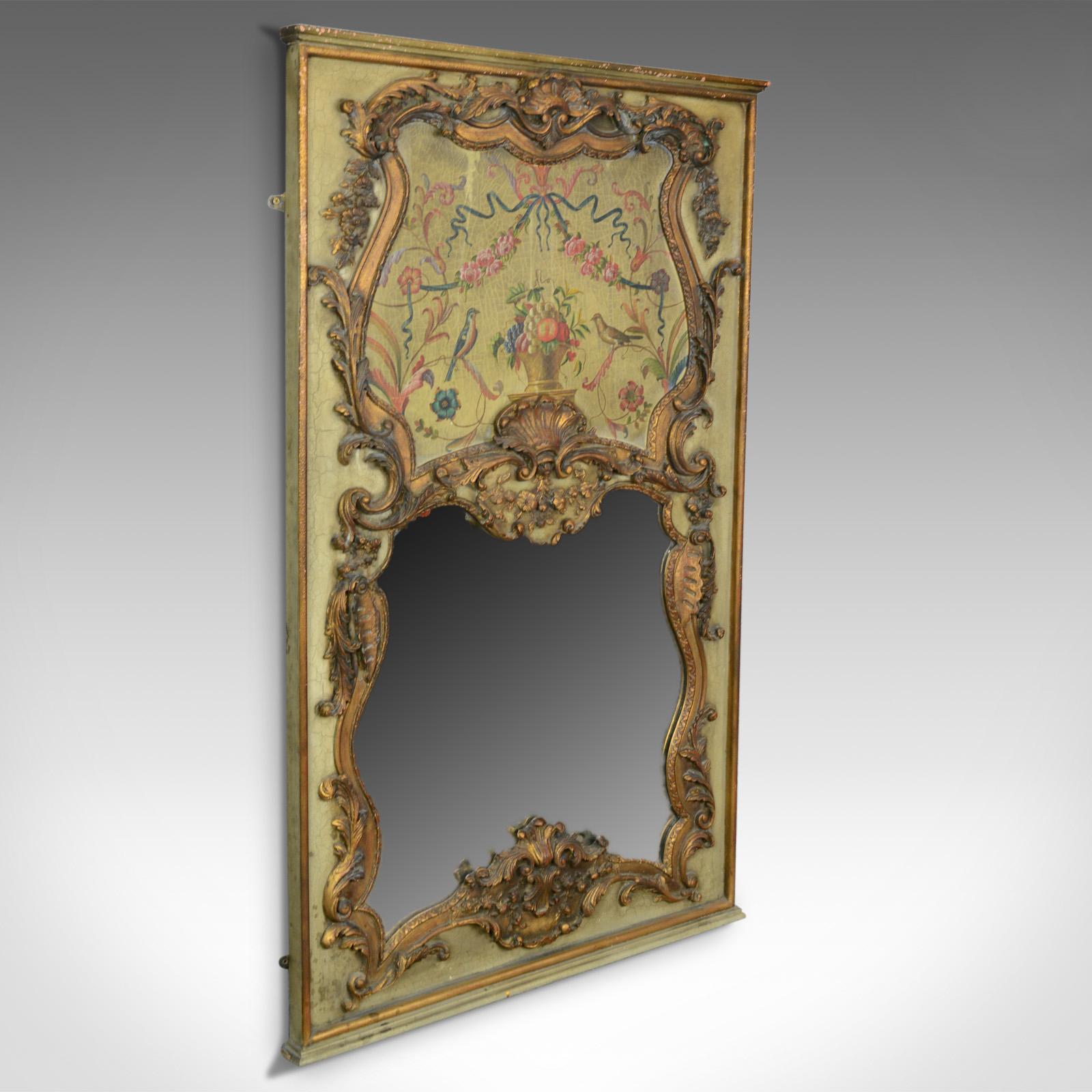 This is a large, French, Rococo Revival wall mirror, a painted, hall or overmantel mirror in giltwood dating to the mid-late 20th century.

Attractive painted composition of fruit, birds, flowers and ribbons on a pale green ground
Framed within