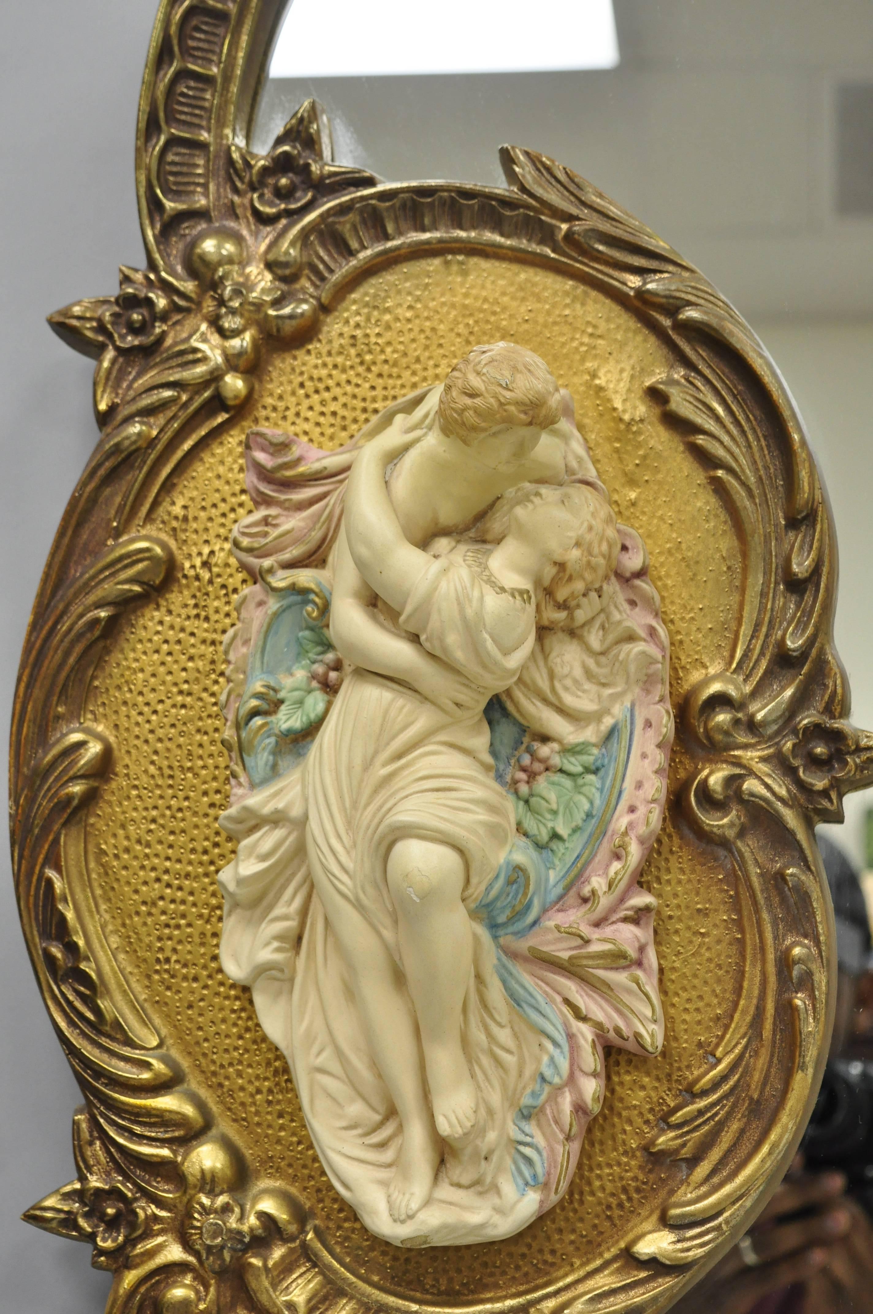 Large French Rococo Style Gold Wall Mirror with Bisque Figural Lovers Plaques In Good Condition In Philadelphia, PA